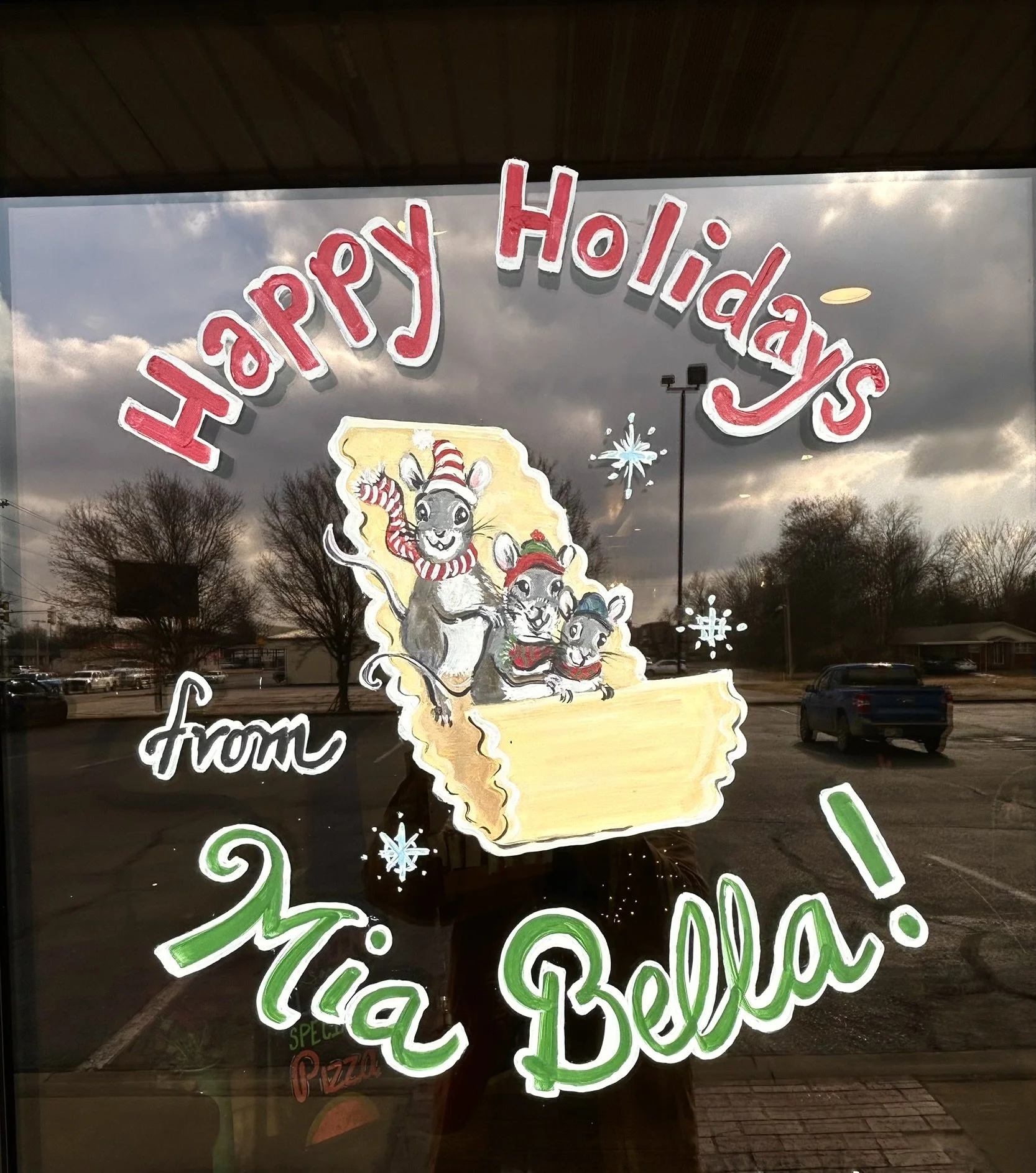 Painting on door of Mia Bella Italian Kitchen on N Main in Miami OK. 2025.