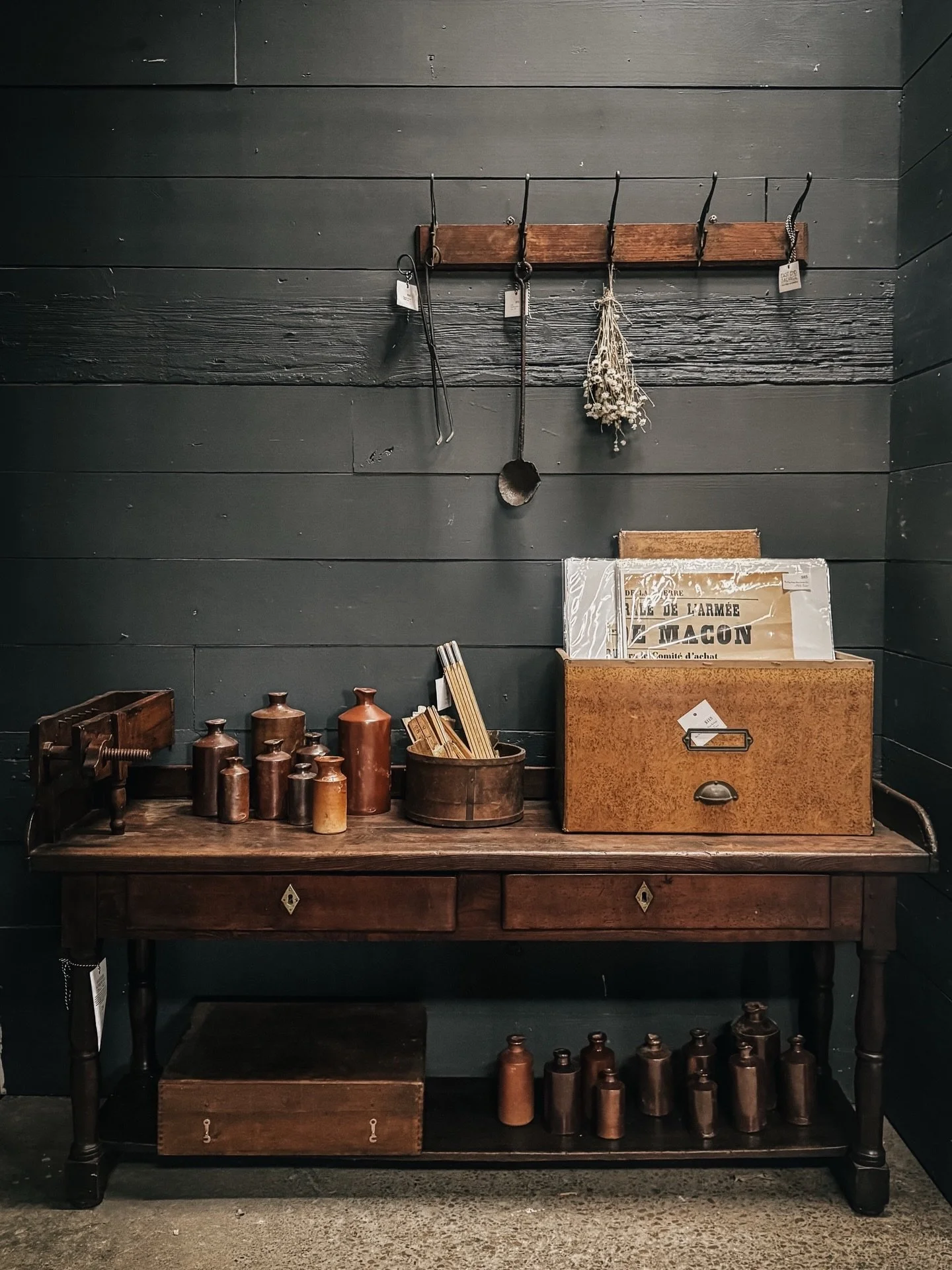 A look inside our historic barn, showcasing the last remaining treasures from this year&rsquo;s collection.

A rare cigar-rolling workbench from Belgium, dating back to circa 1820, now styled as a console table. It features a marbled paper French arc