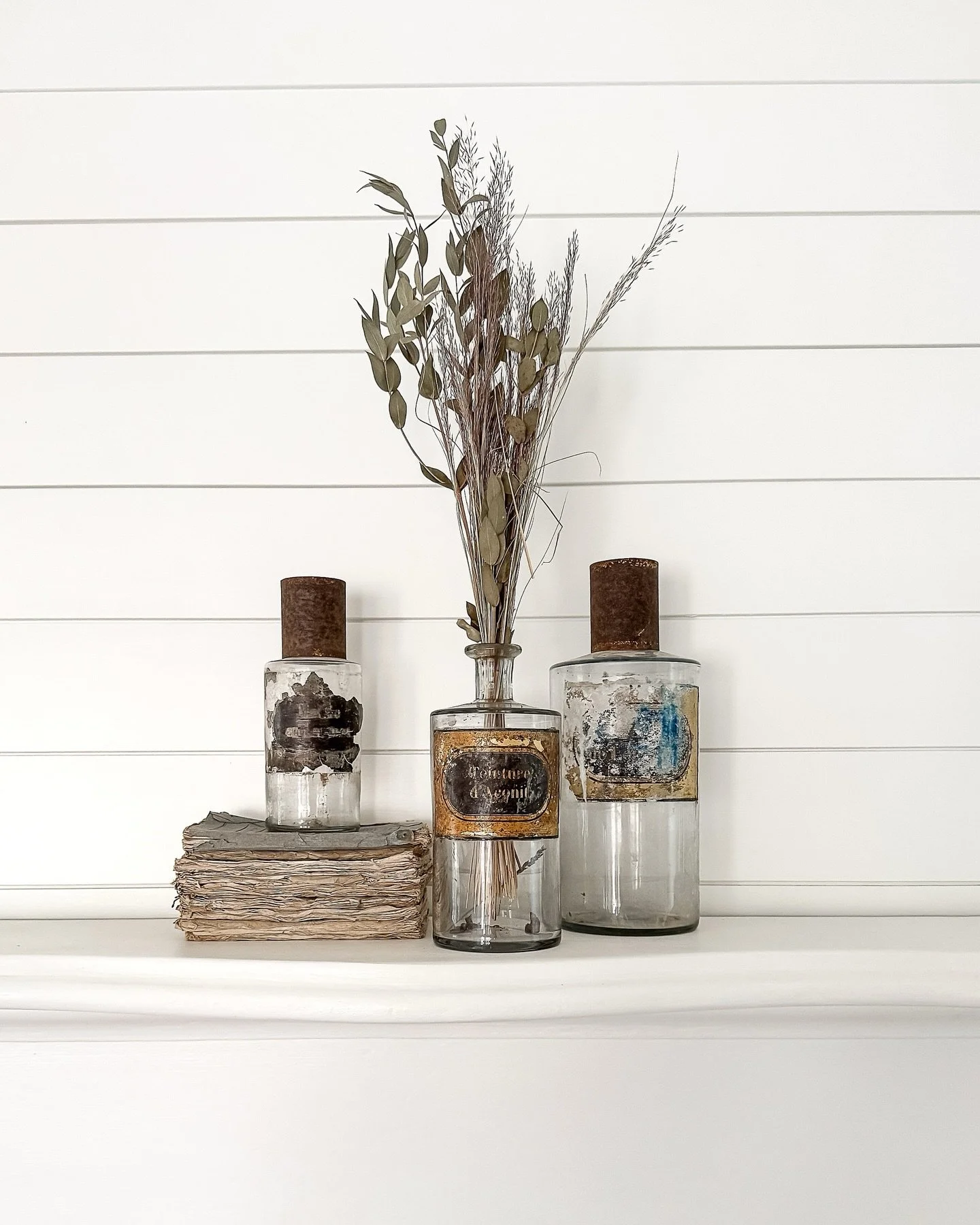 [Available] Centuries-old cures with a side of patina.
 Aged glass, rusted caps, and barely-there labels make these antique French apothecary bottles a favorite kind of found object. Once filled with tinctures and tonics, now perfect for styling shel