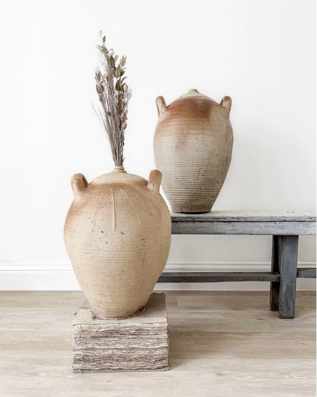 From field to table, long before they became objects we collected.

These oversized 19th-century stoneware vessels were made in Burgundy, France, and likely used for storing and transporting oil&mdash;their generous scale a reminder that they were ma