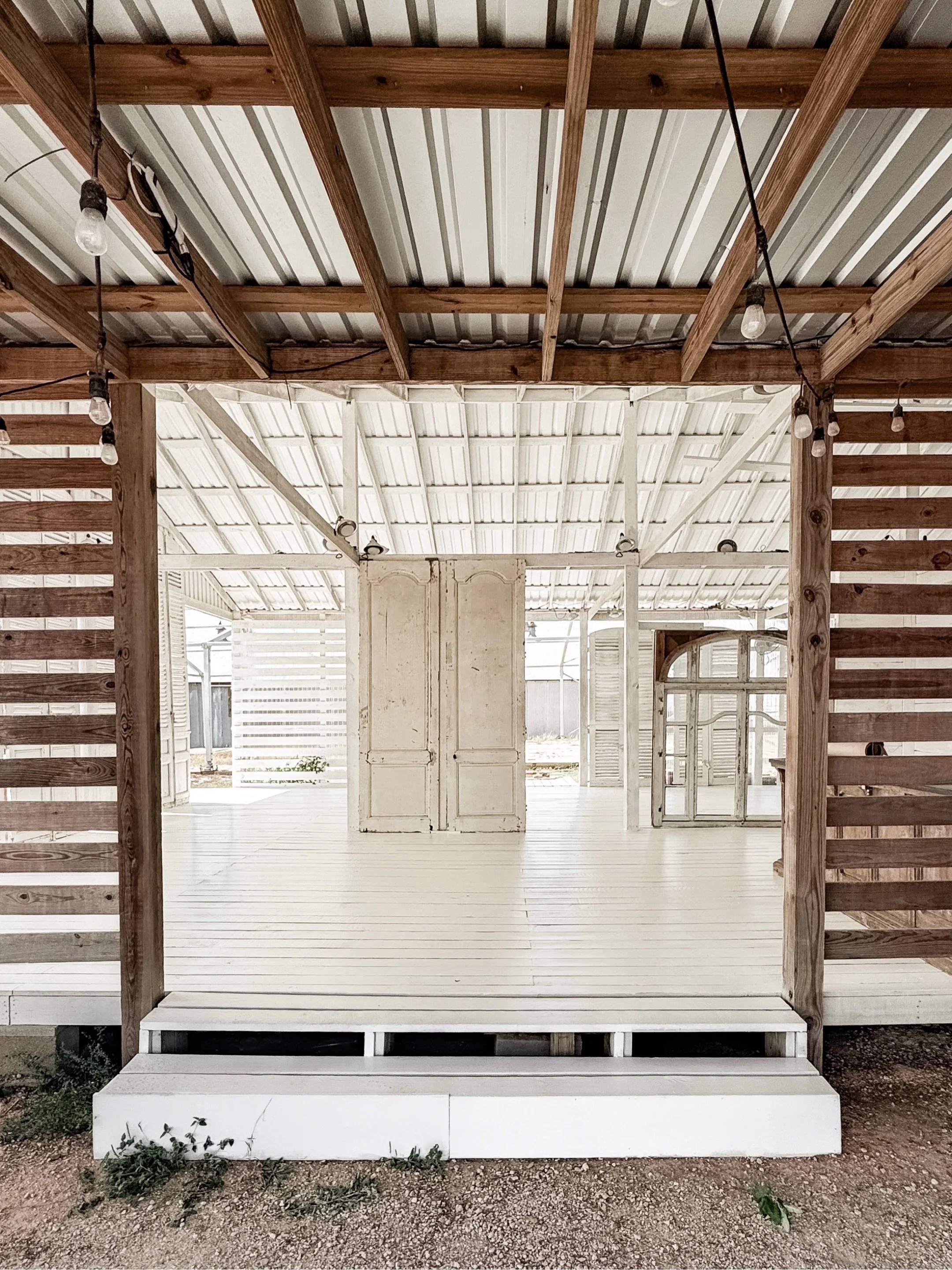 Imagine this space full of new (old) things. 

Tables down the center. Storage pieces lining the walls. Garden objects spilling onto the porch. Layers of European antiques filling every last corner.

Right now, our little white barn at Blue Hills is 