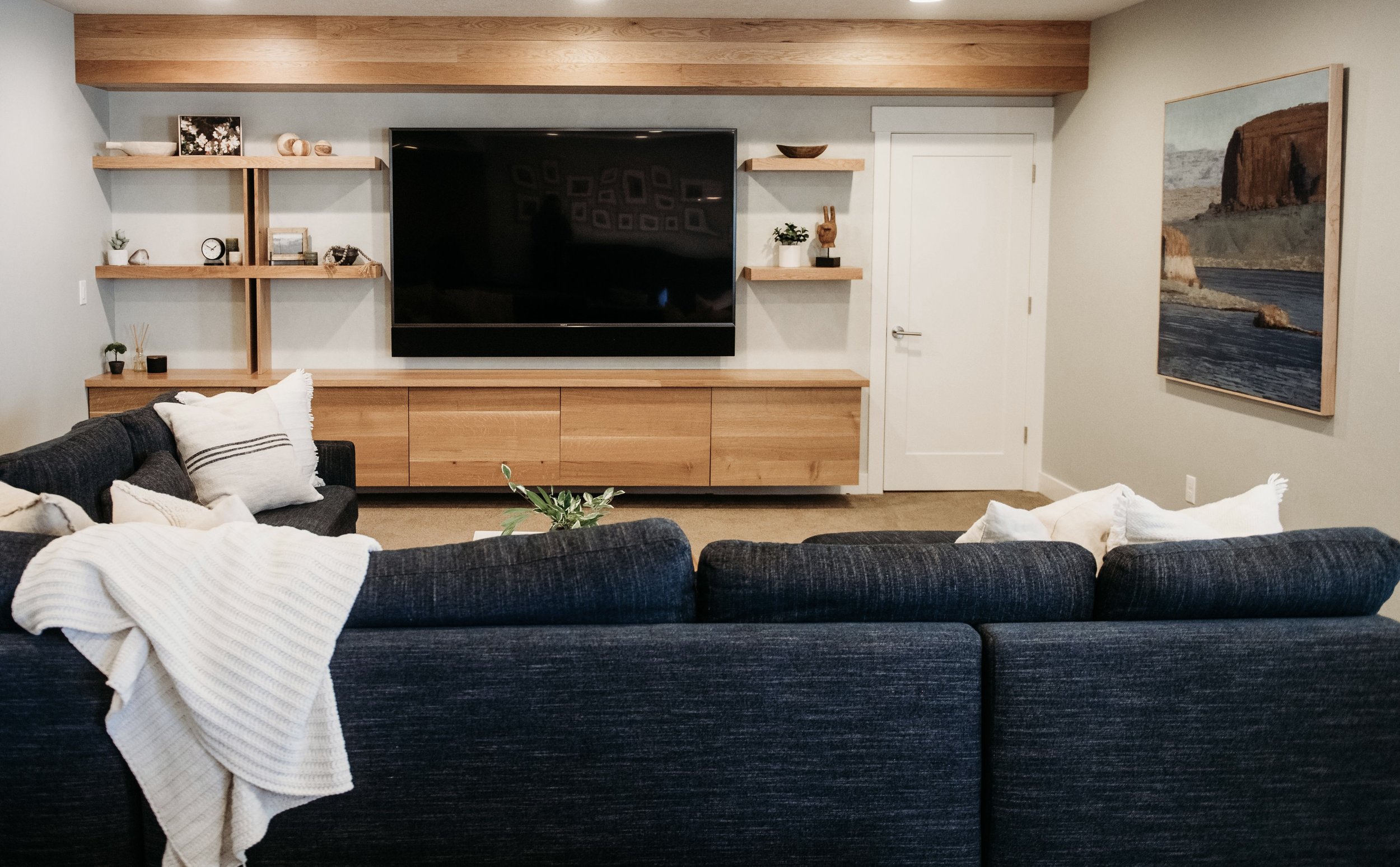 Riley ridd tv surround custom design utah custom white oak cabinetry Courtney derrick fine art oil painting acrylic painting