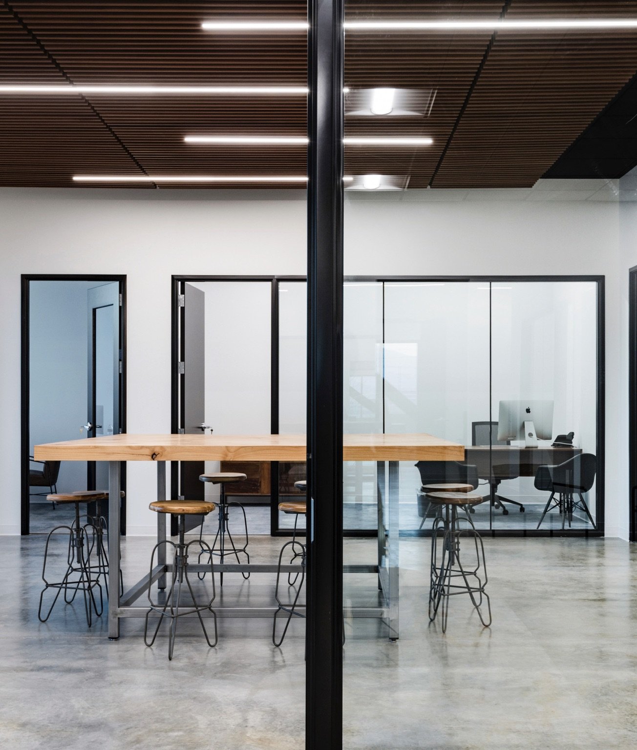 summit Sothebys draper break room table with stools