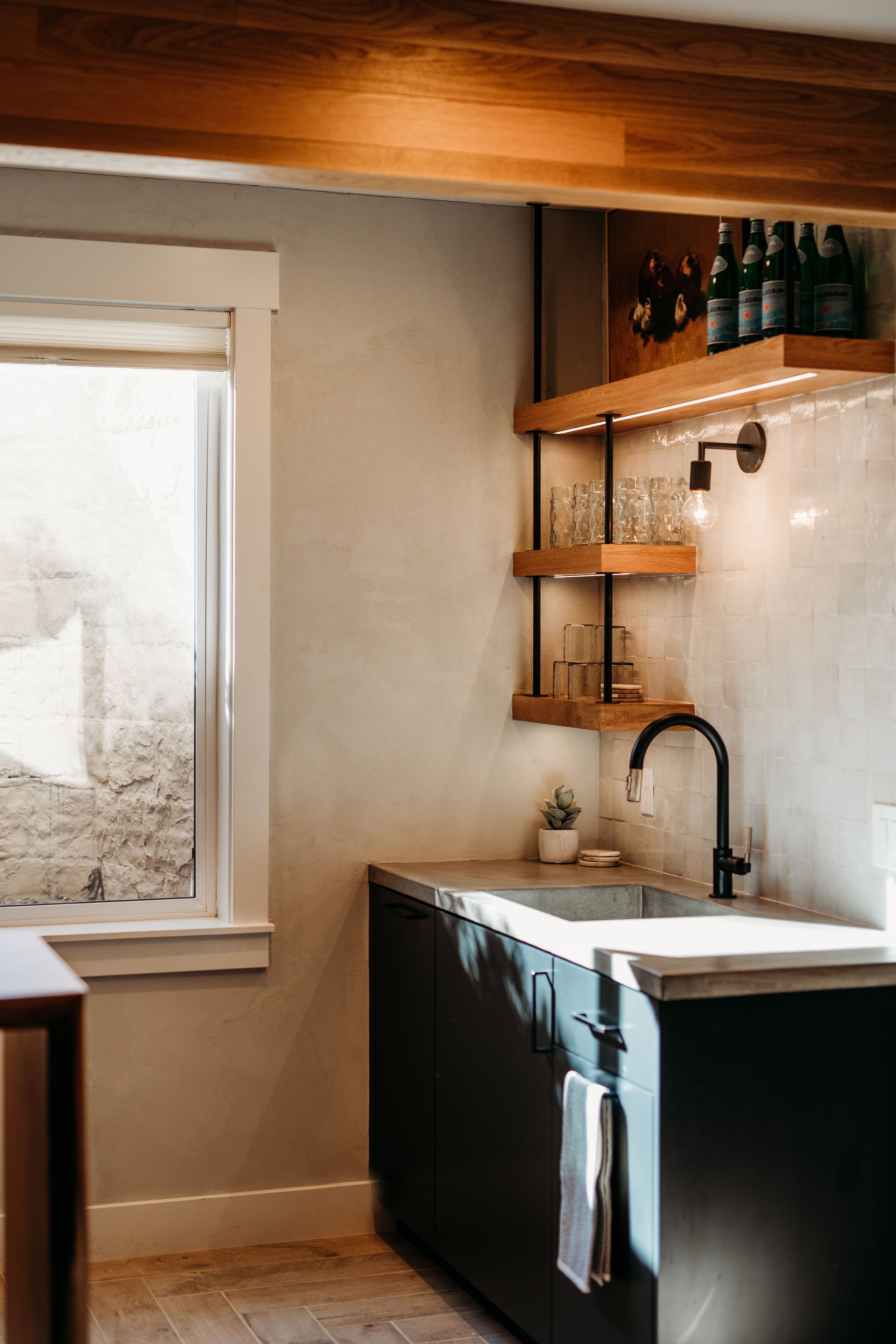 custom kitchenette design utah Riley ridd design zellige tile concrete counter custom cabinetry plaster limewash walls