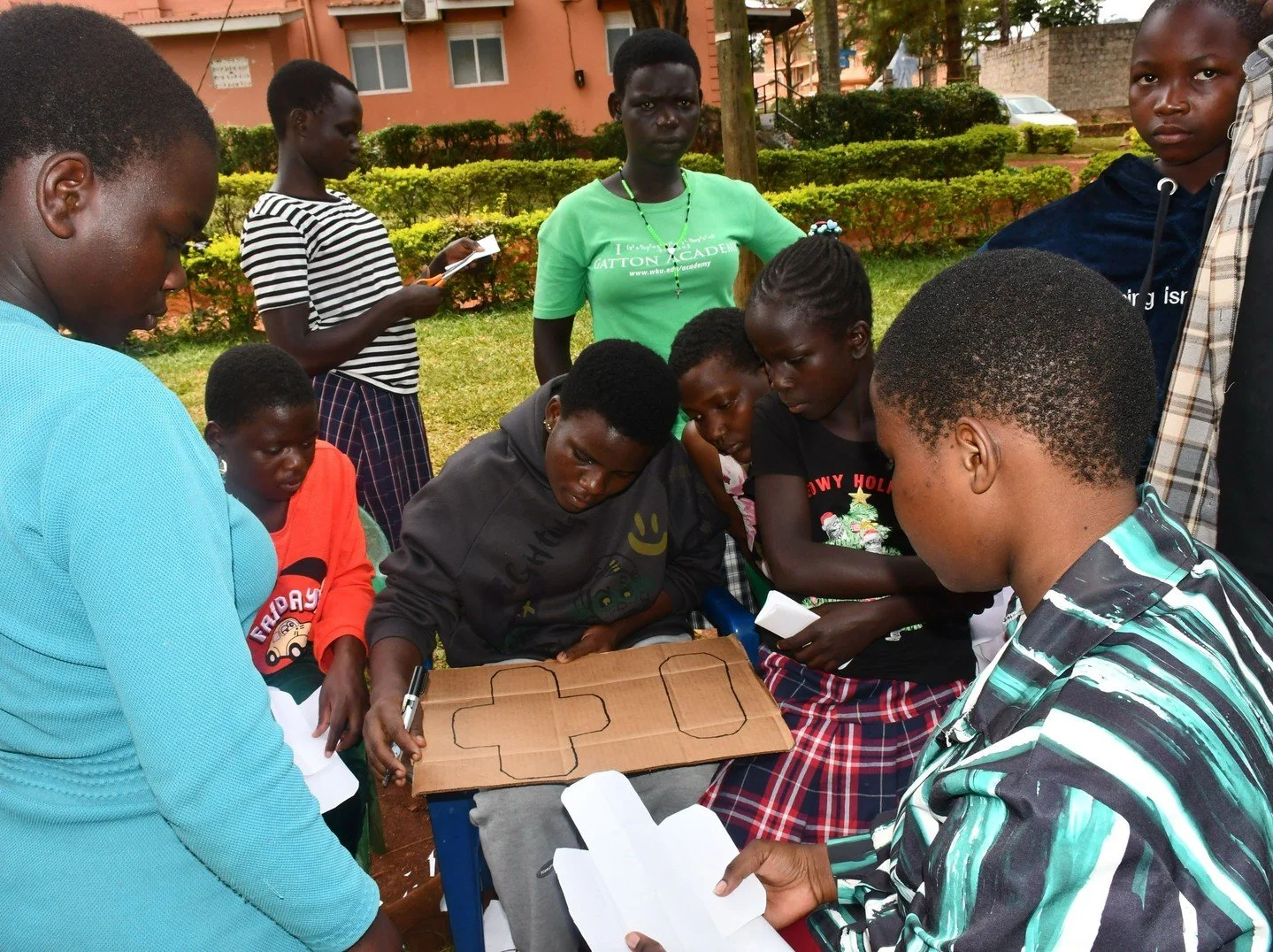 As part of our SRHR exercises, we teach menstrual health. In this session we taught the Shadow Idol Youth Club members how to make reusable sanitary towels. We demonstrated cutting and layering absorbent materials, adding a waterproof backing and sec