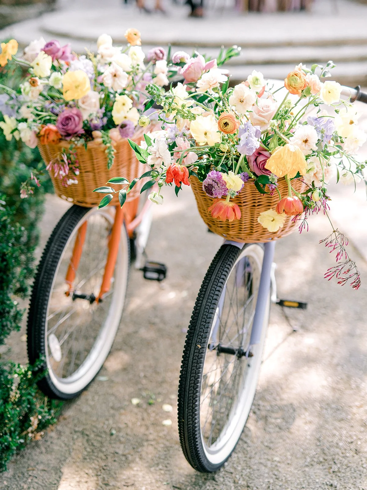 Bikes with baskets of lush wedding florals created by the best College Station florist.