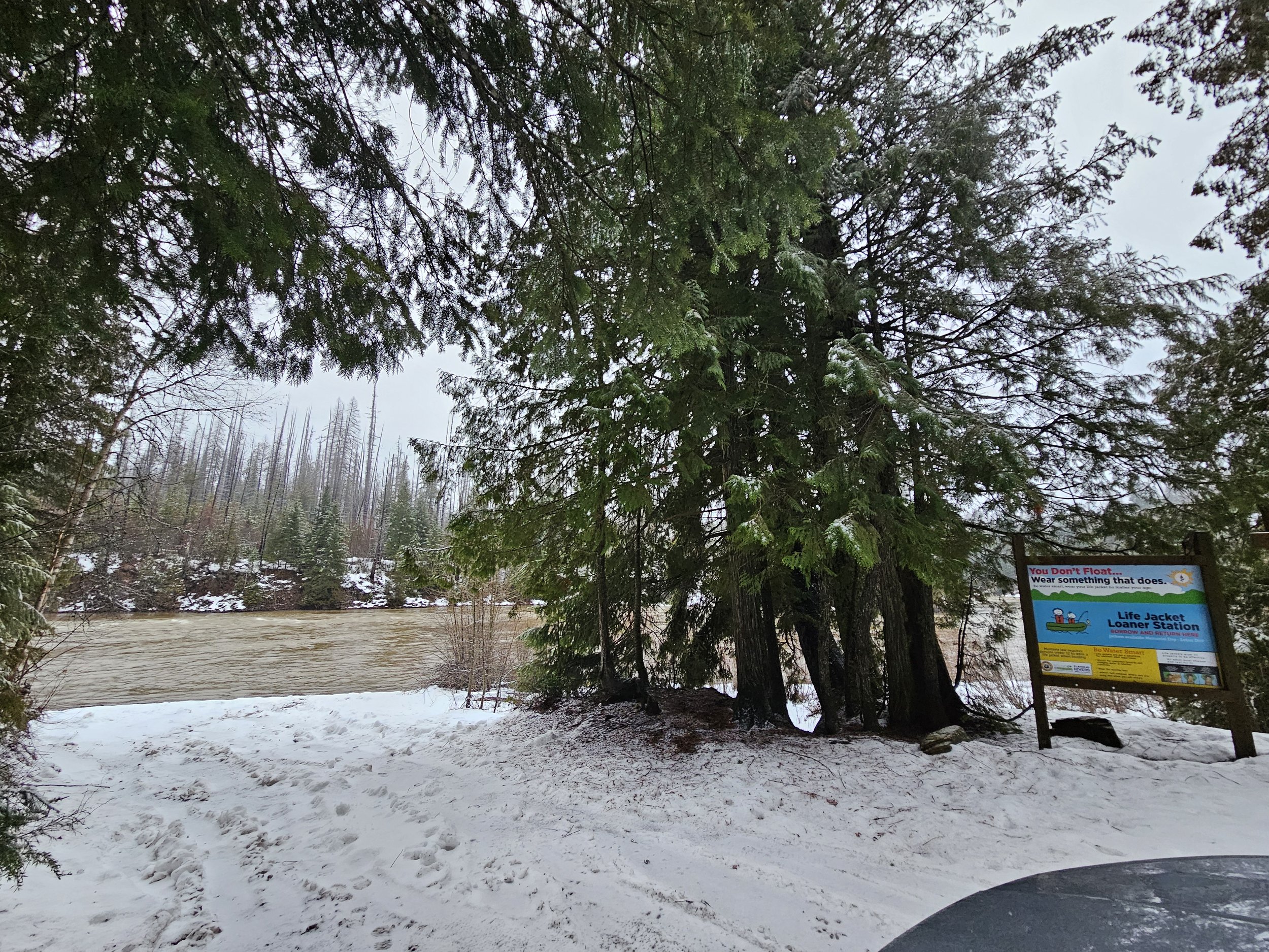Fri., Dec. 12th, 2025 15:41 MST North Fork Flathead Wild &amp; Scenic River looking east towards Glacier National Park from Glacier Rim Boat Launch, MT Photo Credit: Sheena Pate