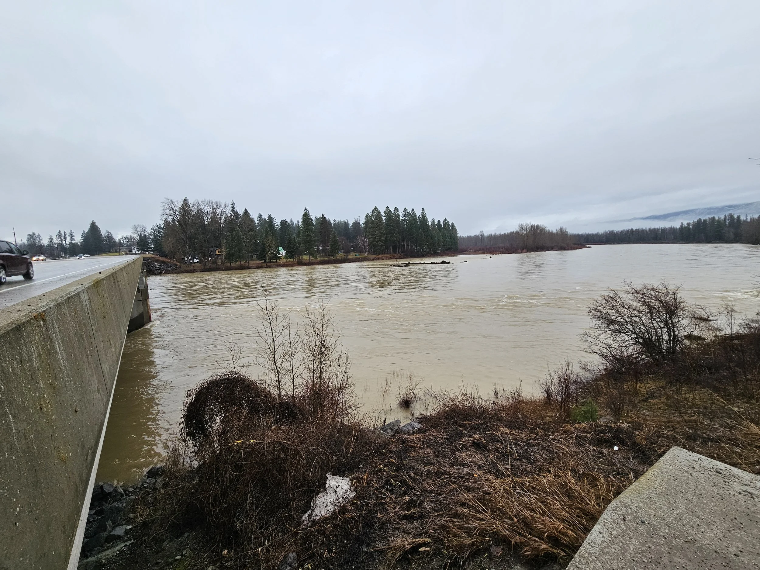 Friday, Dec. 12th, 2025 12:49 MST Mainstem of Flathead River looking upstream from HWY 2 Bridge, near Columbia Falls, MT Photo Credit: Sheena Pate