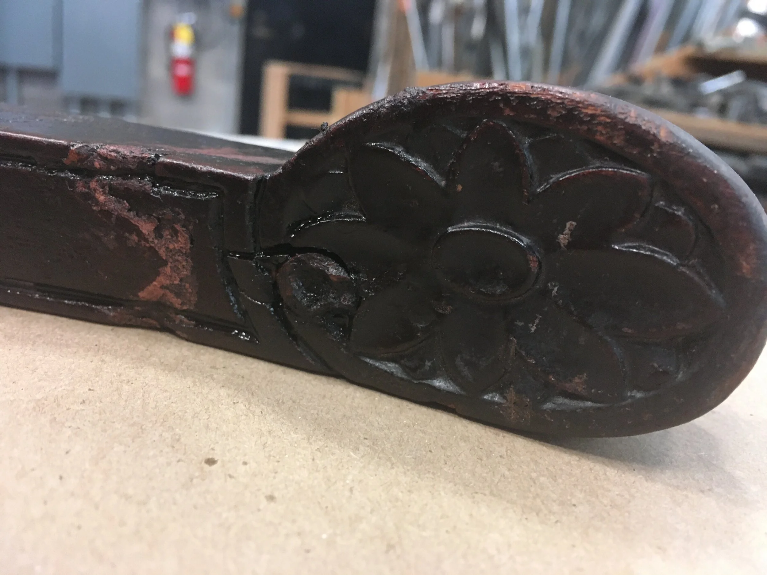 Broken arm repaired, carved dowel