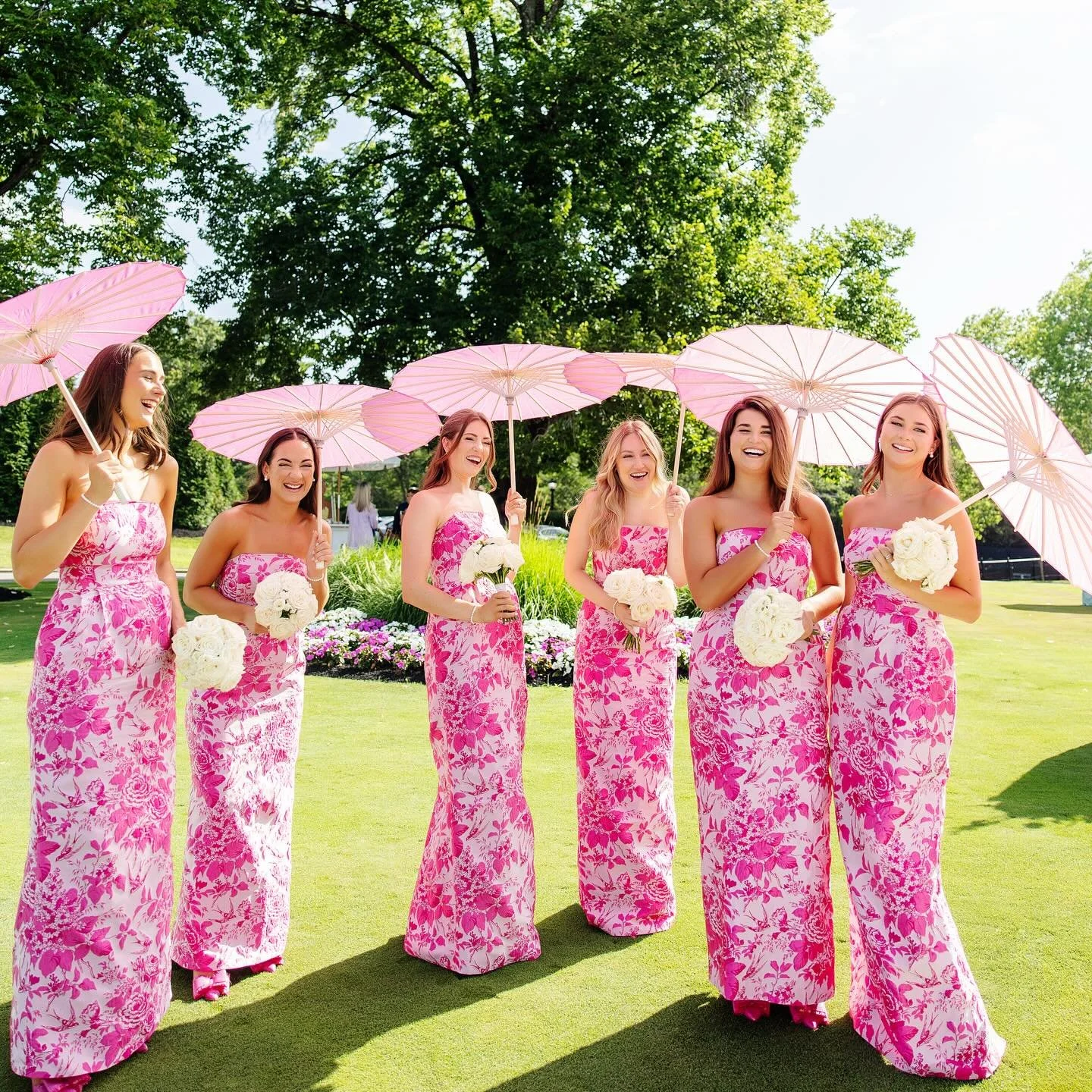 Bridesmaids with parasols &amp; pink dresses are the best combination 💗 

@kortneekatephoto 
@yellowcanarycincinnati 
@lulakate 
@cincinnaticountryclub 
@vividweddingvideos 
@bridefaceotr 
@ellieruevecappel