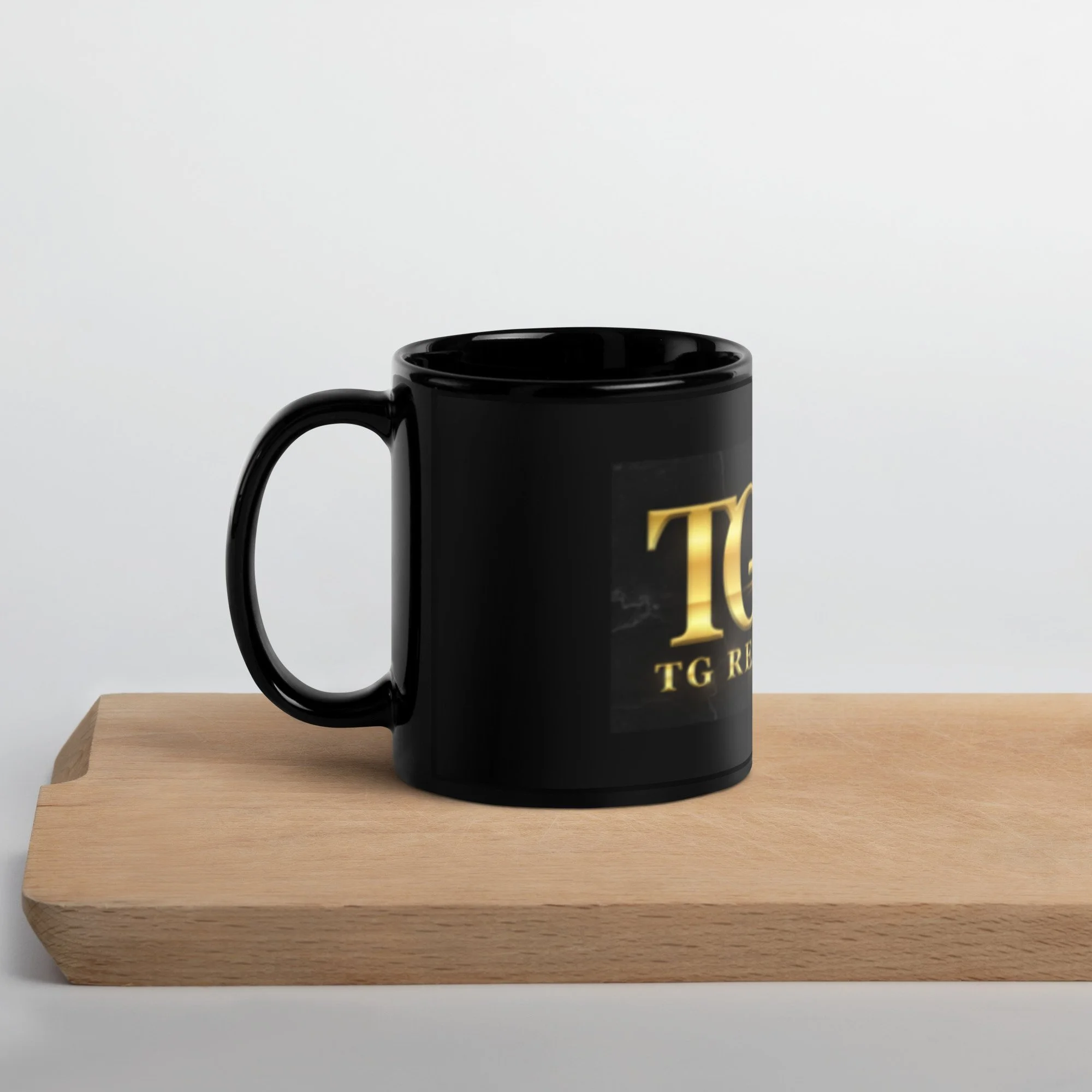 black-glossy-mug-black-11oz-handle-on-left-644c26e15359b.jpg