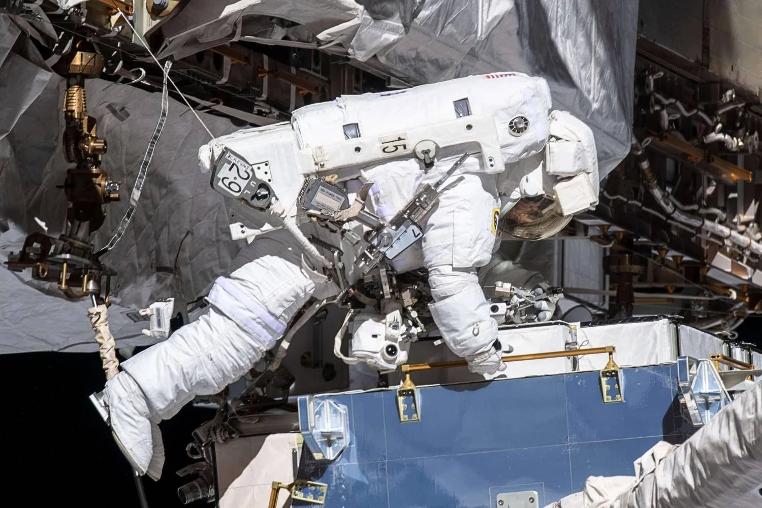 Christina Koch spacewalking outside the International Space Station during her NASA mission