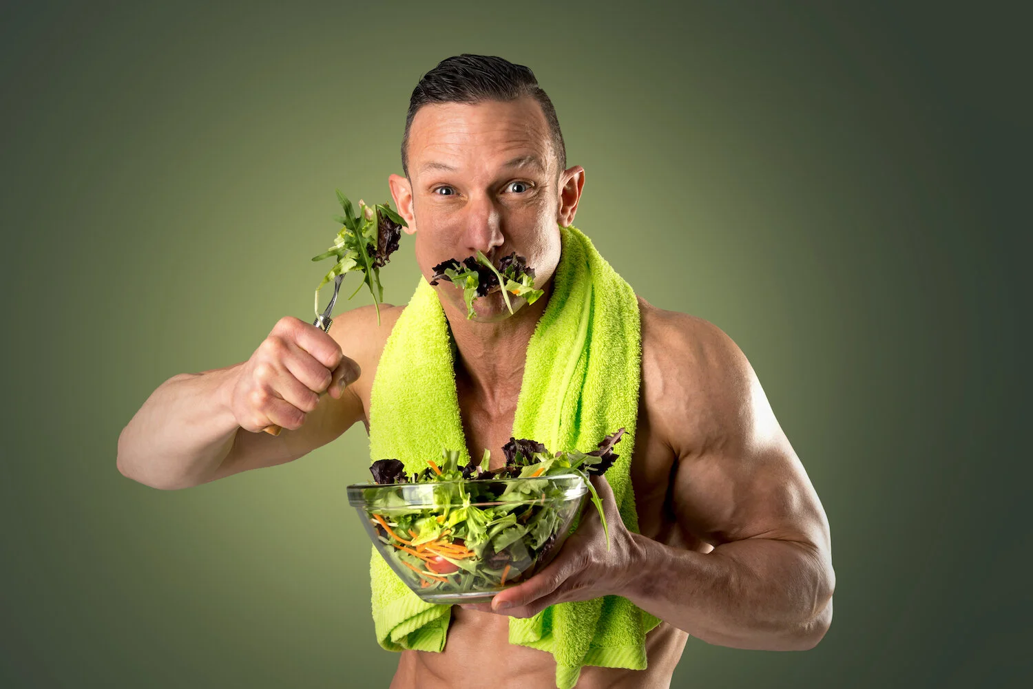 Man eating healthy nutritious bowl of salad