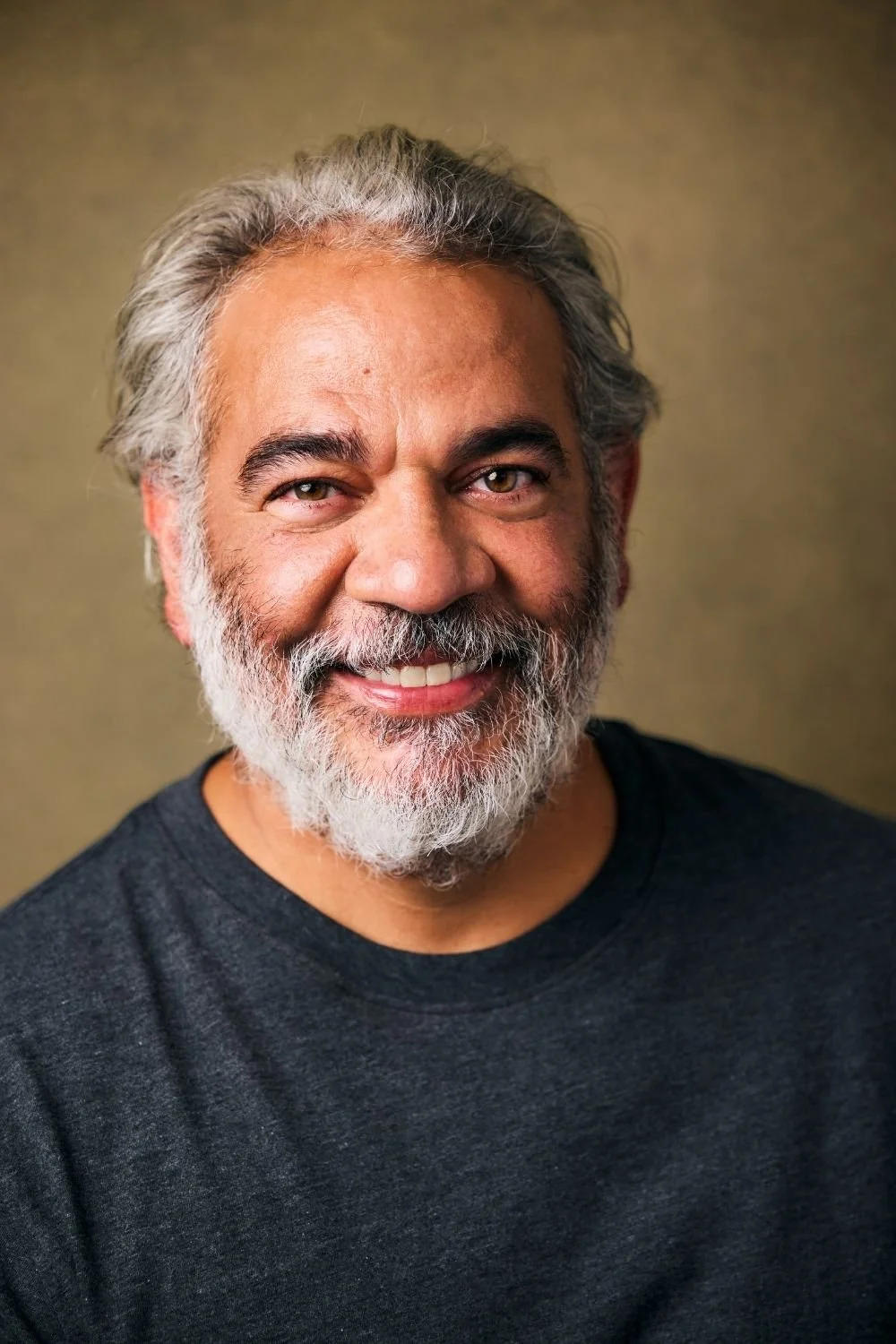 Actor Hemky Madera smiling during OnFitness Magazine interview about family, fitness, and balance