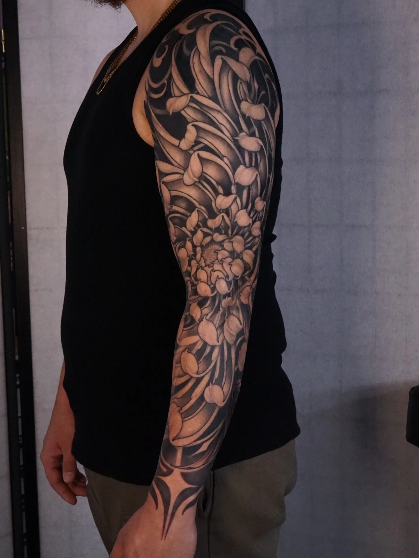 This chrysanthemum Blackwork sleeve for Nick. 
This was his first large scale piece and sat like a champ. Also was an open concept design, meaning he basically left it up to me to draw up something for him and this is what we landed on. 
Done at the 
