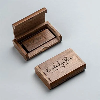 Open wooden box and closed wooden box with Kimbalaya branding on top