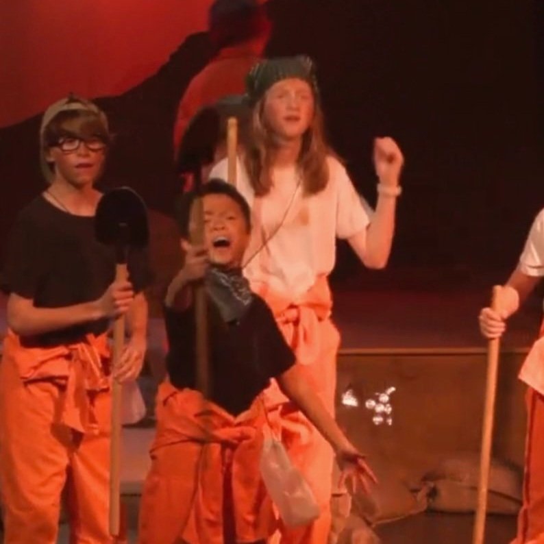 I auditioned and was selected to play a leading character, Magnet, in the annual 2023 school theatre production, Holes.