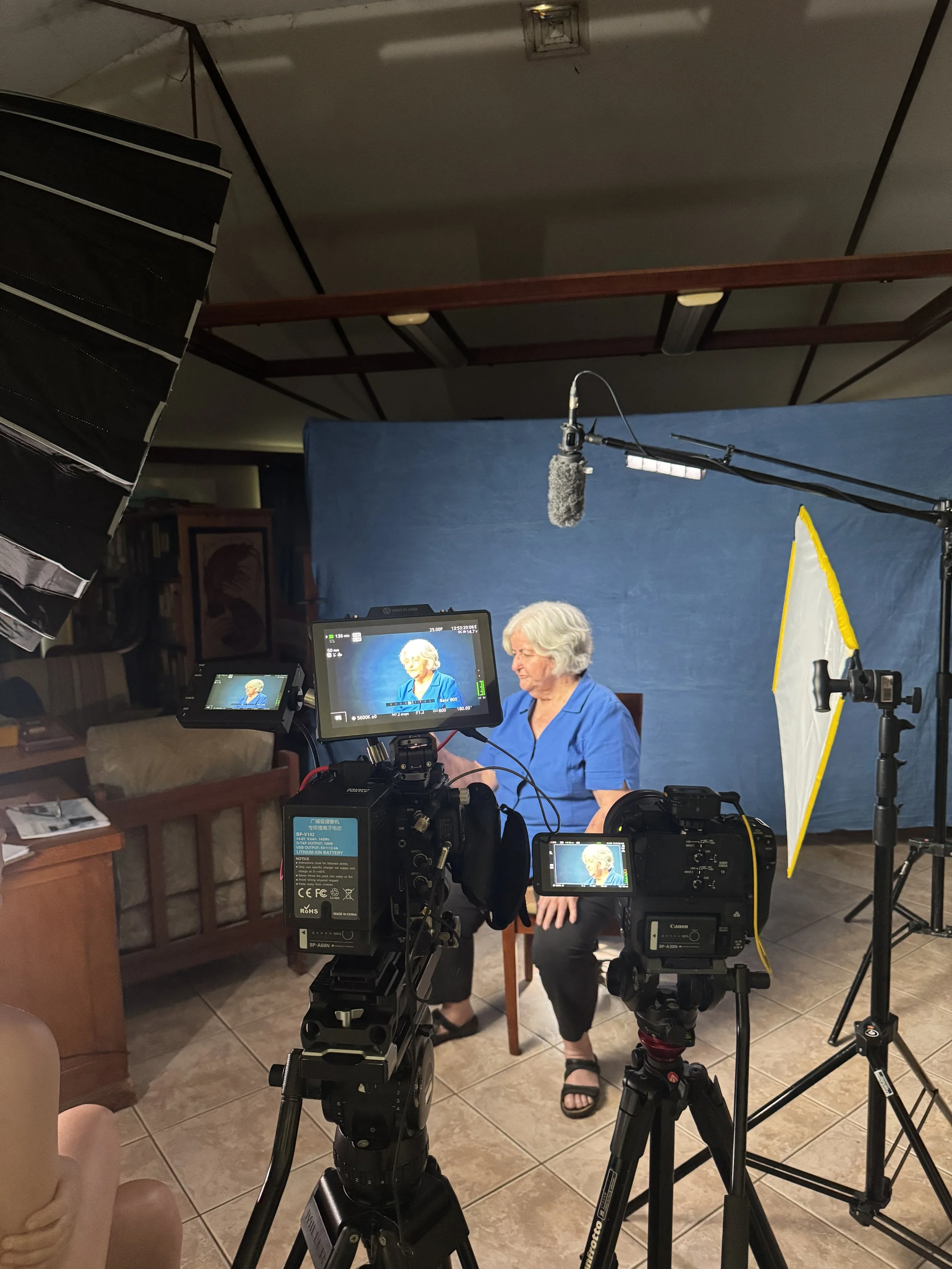 llison-reef-documentary-interview-setup-blue-backdrop.jpg