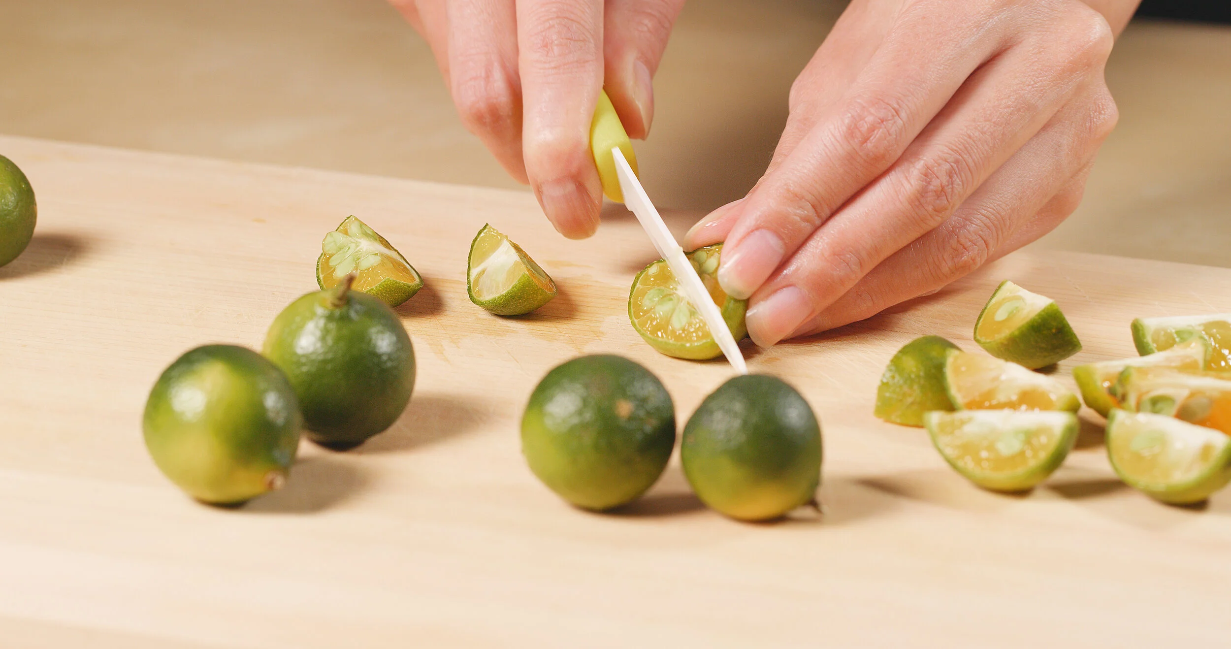 cutting-citrus-on-wooden-cutting-pad-2021-04-05-07-13-55-utc.jpg
