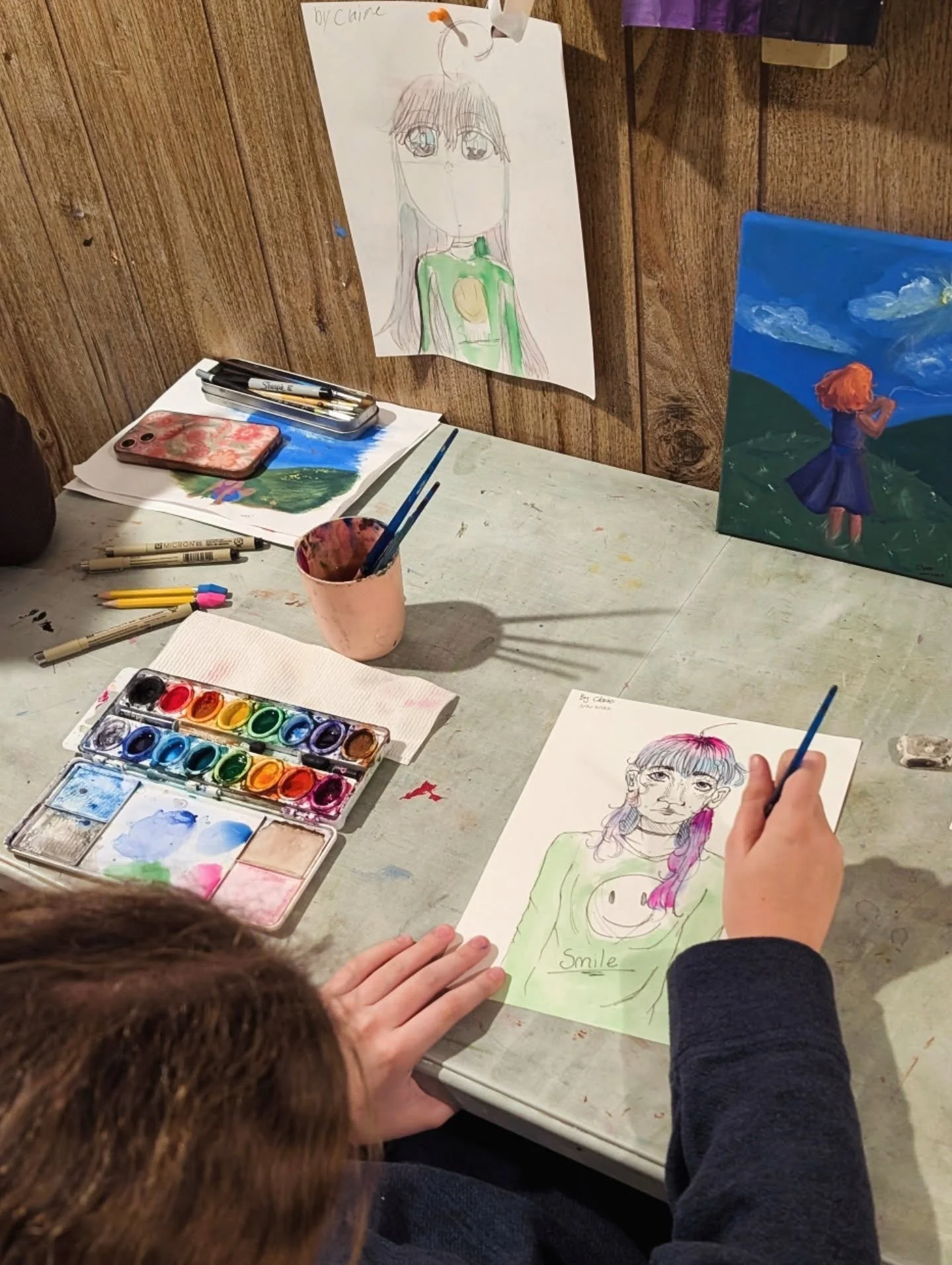 After 2 years of lessons with us, our art student Claire is re-creating one of her first portraits she ever created with us! She's learned to develop her personal sense of art style, how to work with and enjoy using colors more, and gain confidence i