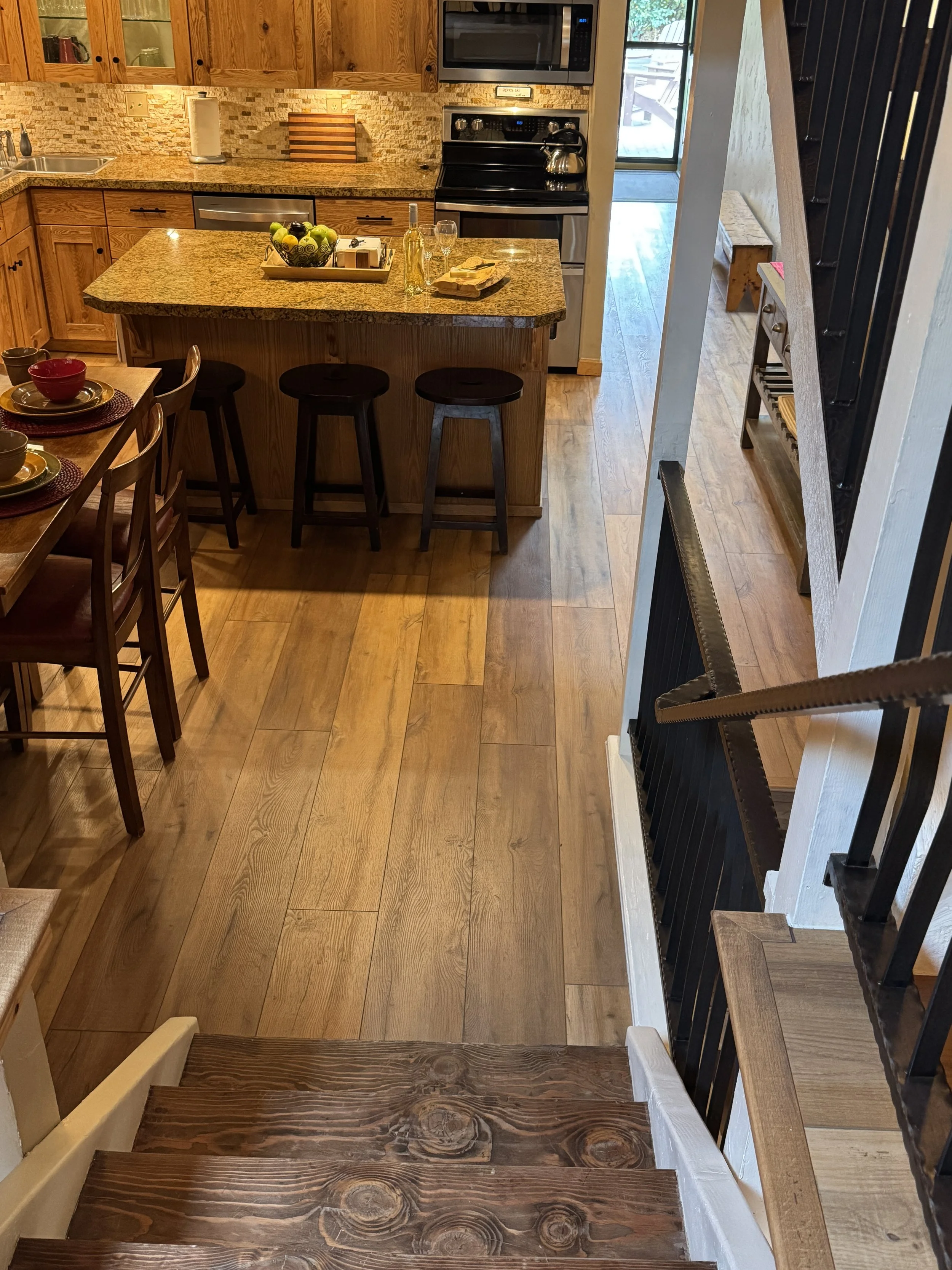 A view from the loft down into the kitchen
