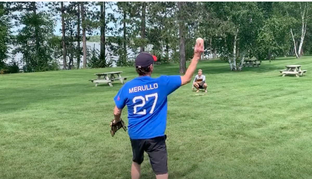 Me and my dad playing catch at the cabin.
