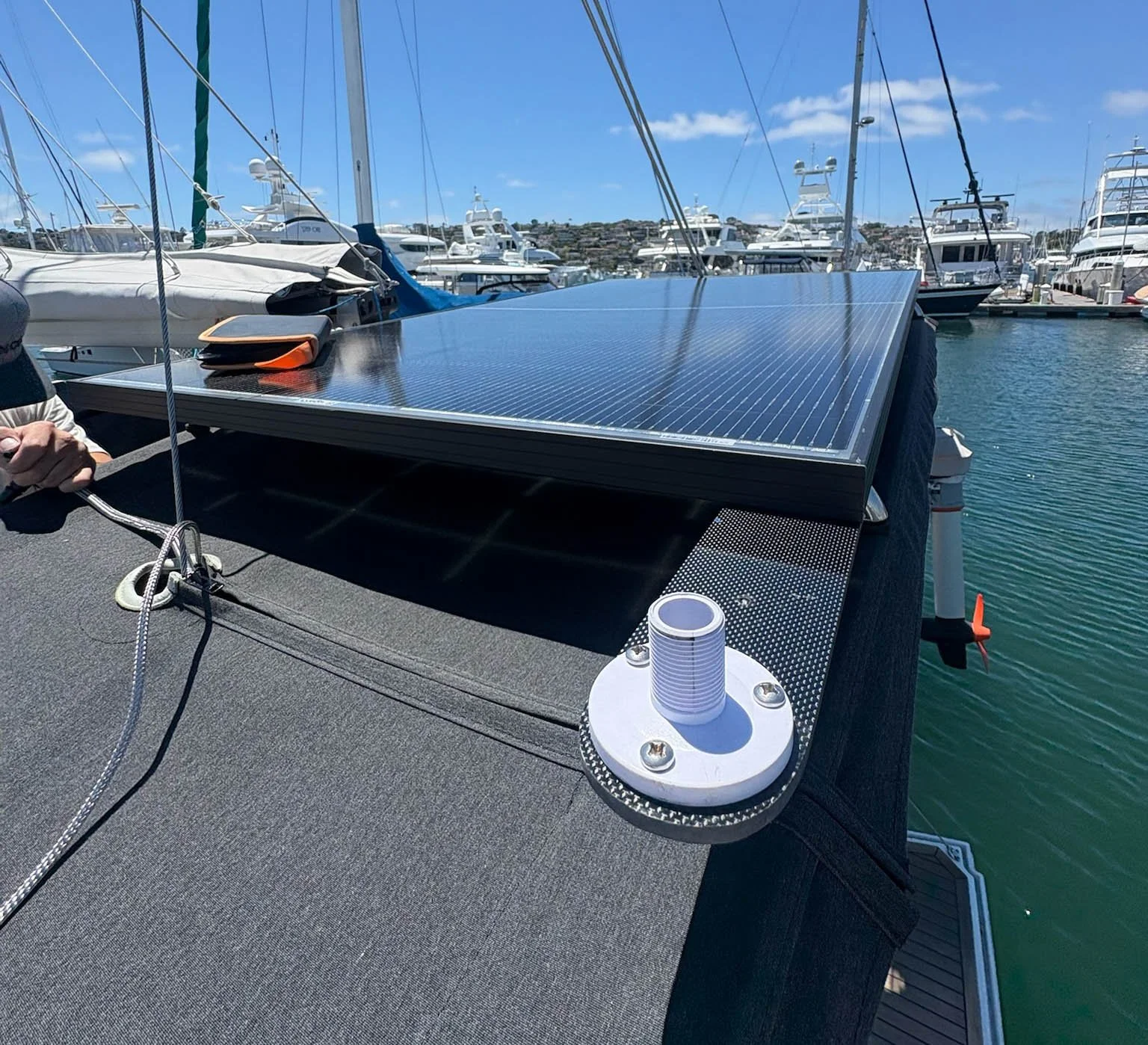 Starlink Mini mounted on custom carbon fiber bracket aboard sailboat