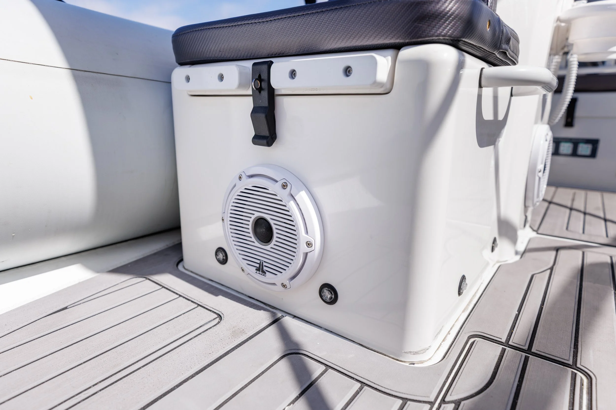 JL Audio M6 marine speakers installed on a yacht tender for high-quality sound on the water.