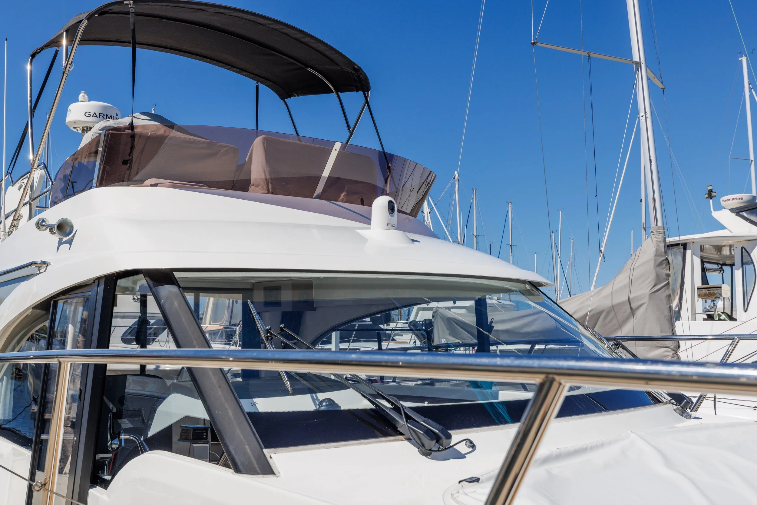 Forward-facing SIONYX Nightwave camera mounted at the front of a Beneteau Antares 11 for low-light navigation.