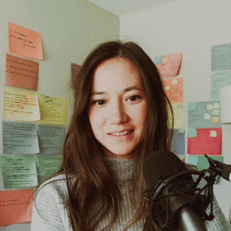 Host Mara Measor recording into microphone