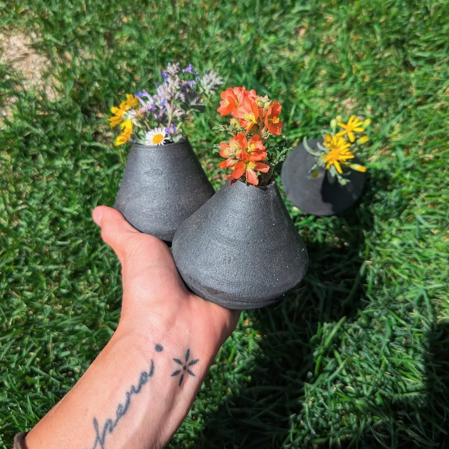 Loading up a batch of tiny treasures for Fireweed Market this Saturday in SLC! 
These matte black bud vases and mini chimineas are coming along for the ride. Small in size but full of texture, intention, and warmth. Hope to see you there!

@fireweedm