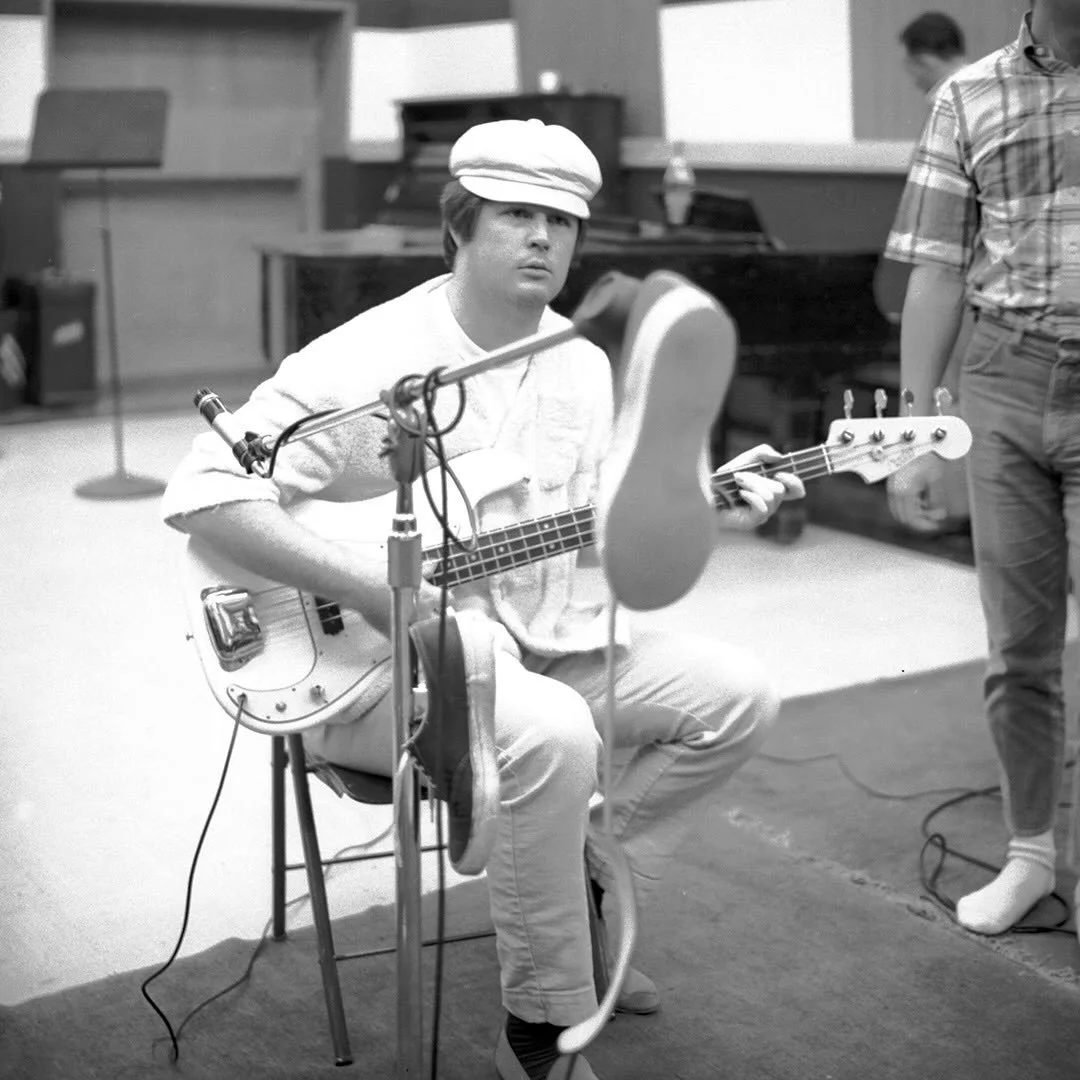 1965: Brian woking out a bass part in the studio.