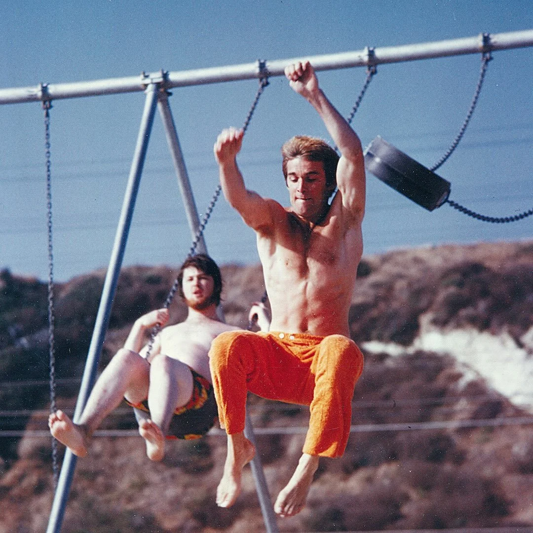 Summer 1967 Zuma Beach CA: Brian and Dennis taking time out during a Beach Boys photoshoot.