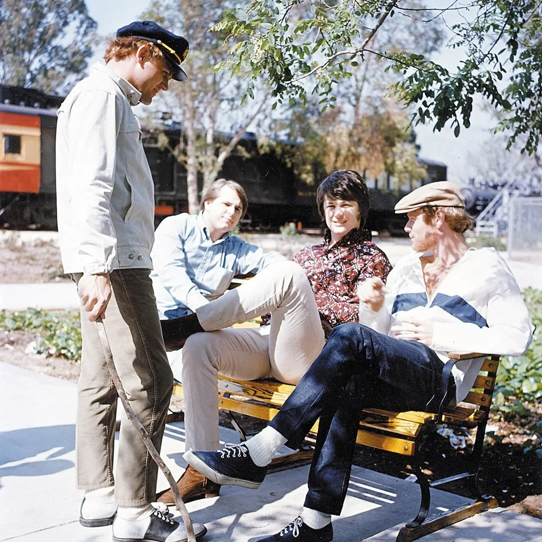 1966: Brian, Carl, Bruce and Mike taking a break from a photoshoot at Travel Town - Griffith Park, Hollywood, California.