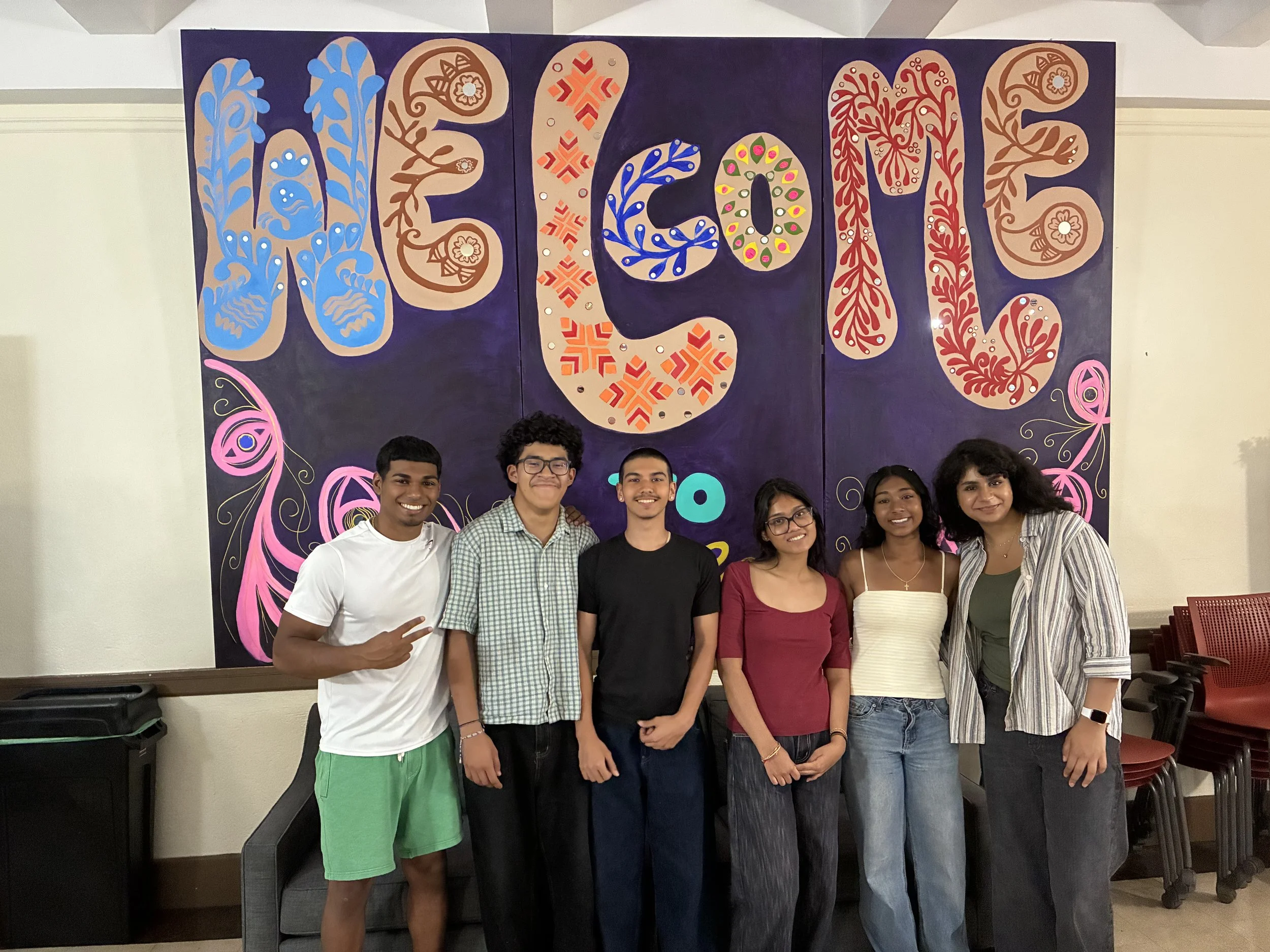 Group of 6 young interns smiling