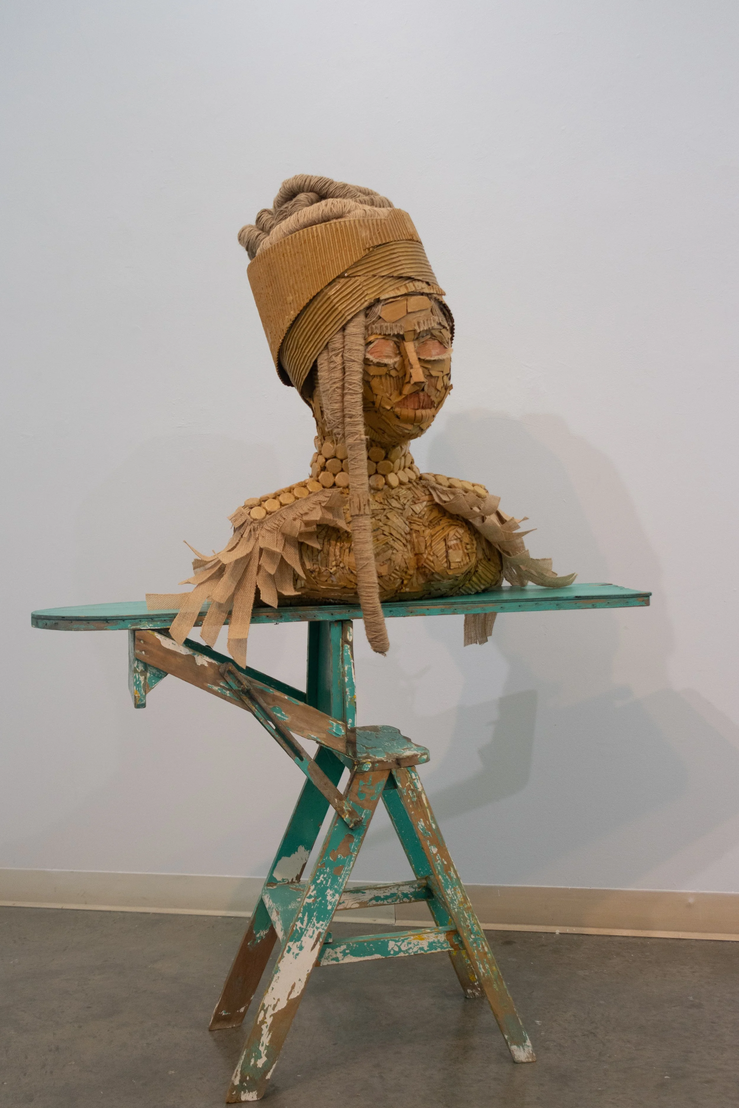 Makeda 2021 Recycled cardboard, Natural fibers, Bottle caps, Newspaper, and Found object 