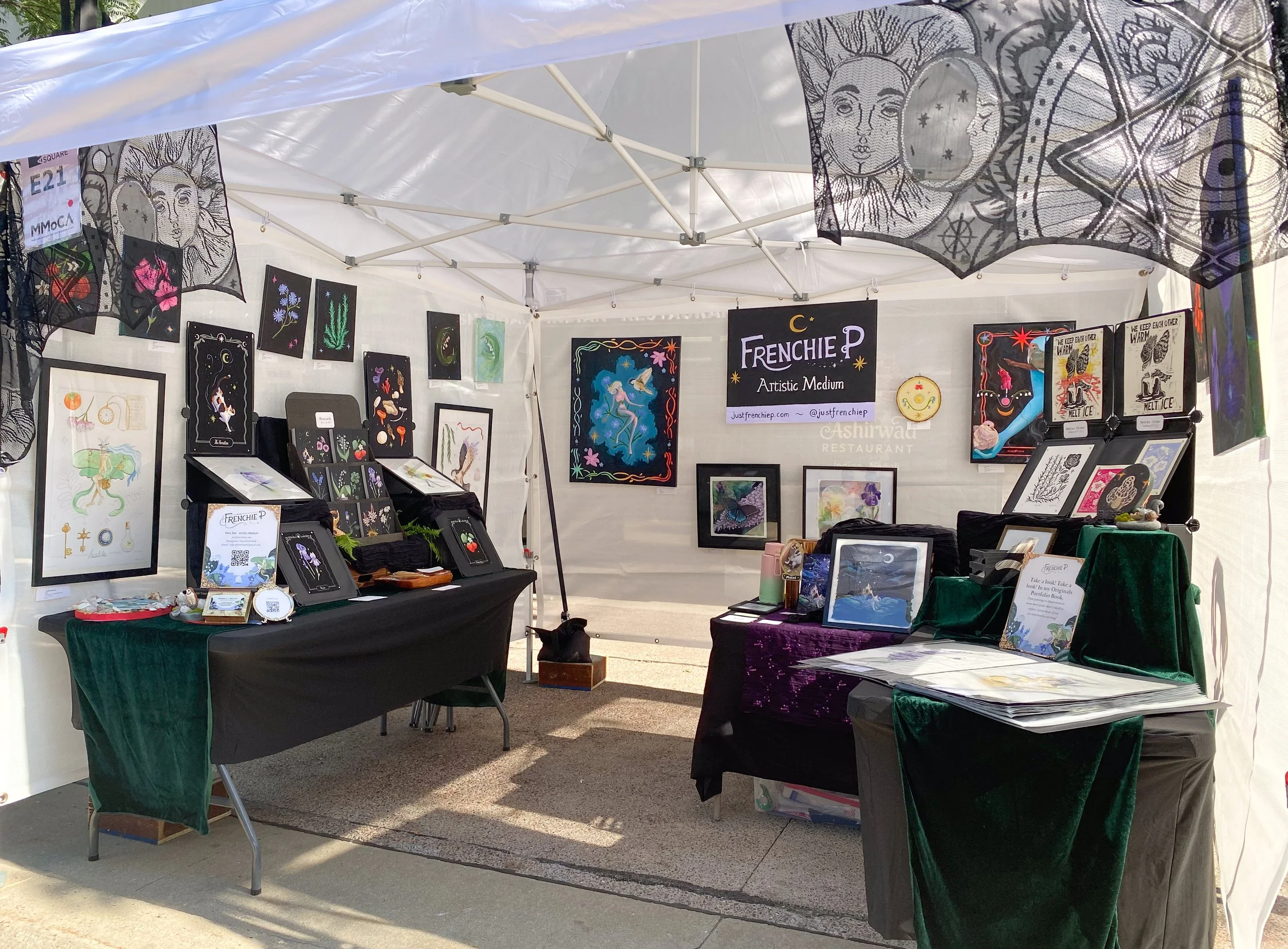 Outdoor booth display at Art Fair on the Square in Madison, WI