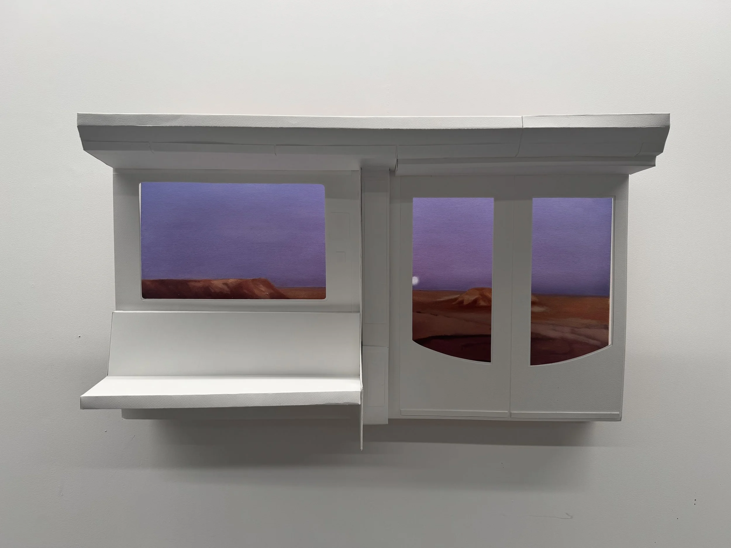 Clydine Carboni, come back..., 2026. White paper sculpture of a train carriage with windows revealing painted purple and red landscape behind.