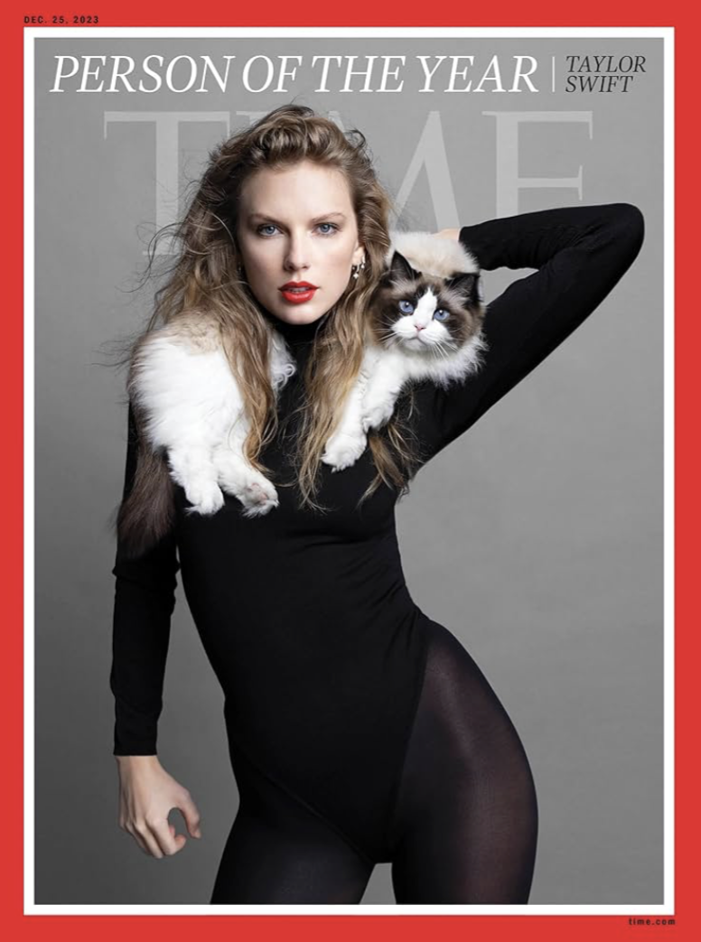 Taylor Swift on the cover of TIME Magazine wearing a black outfit with her Ragdoll cat Benjamin Button draped around her neck