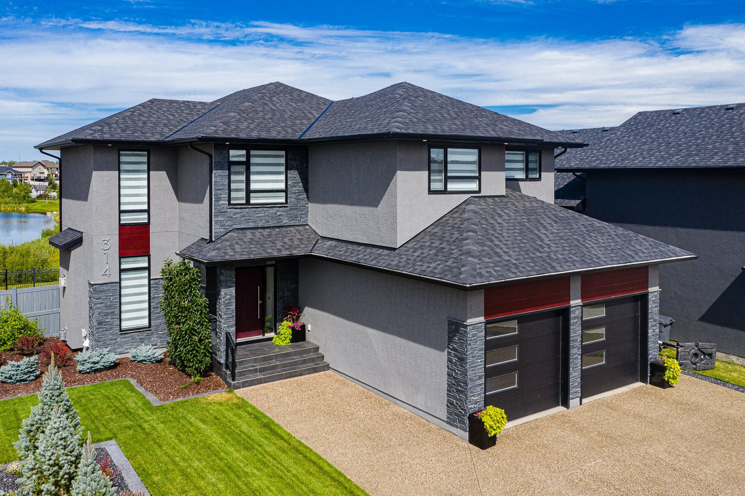 Front exterior of a Saskatoon-area home photographed in clear daylight