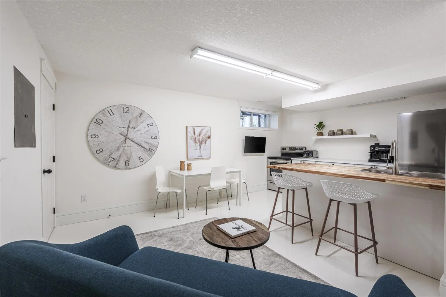 Compact rental suite photographed with professional care