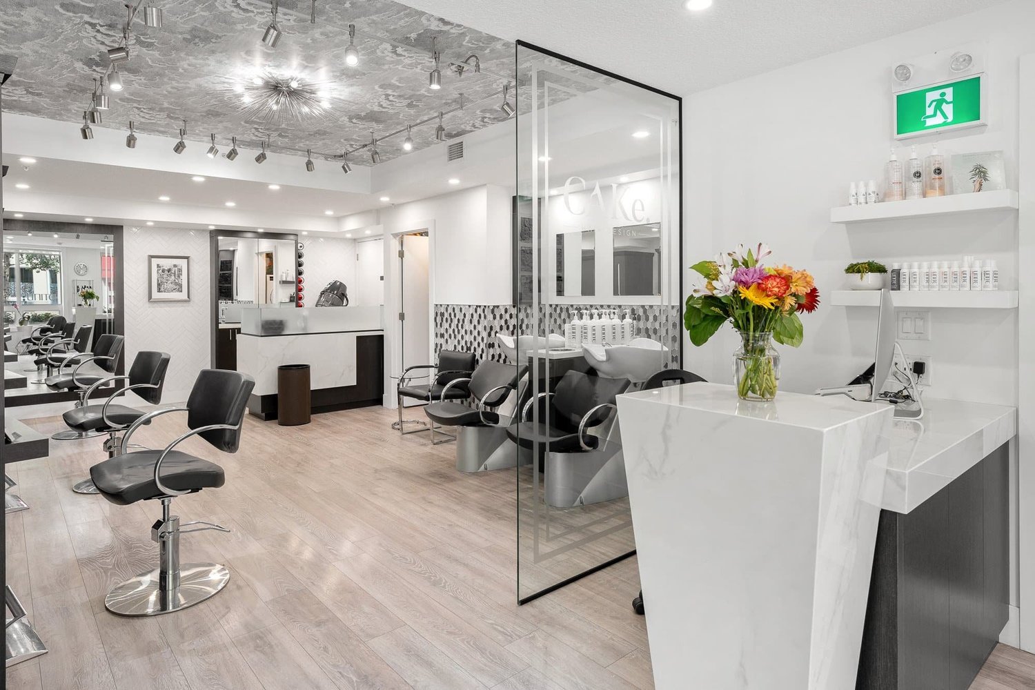 Contemporary commercial salon interior showing layout, finishes and lighting