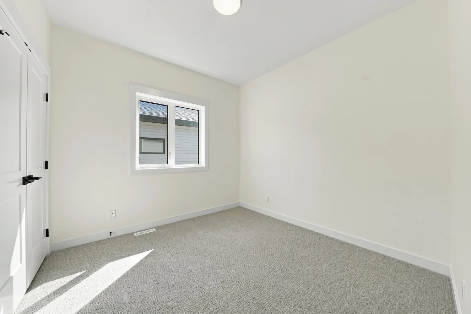 Empty secondary bedroom before virtual staging