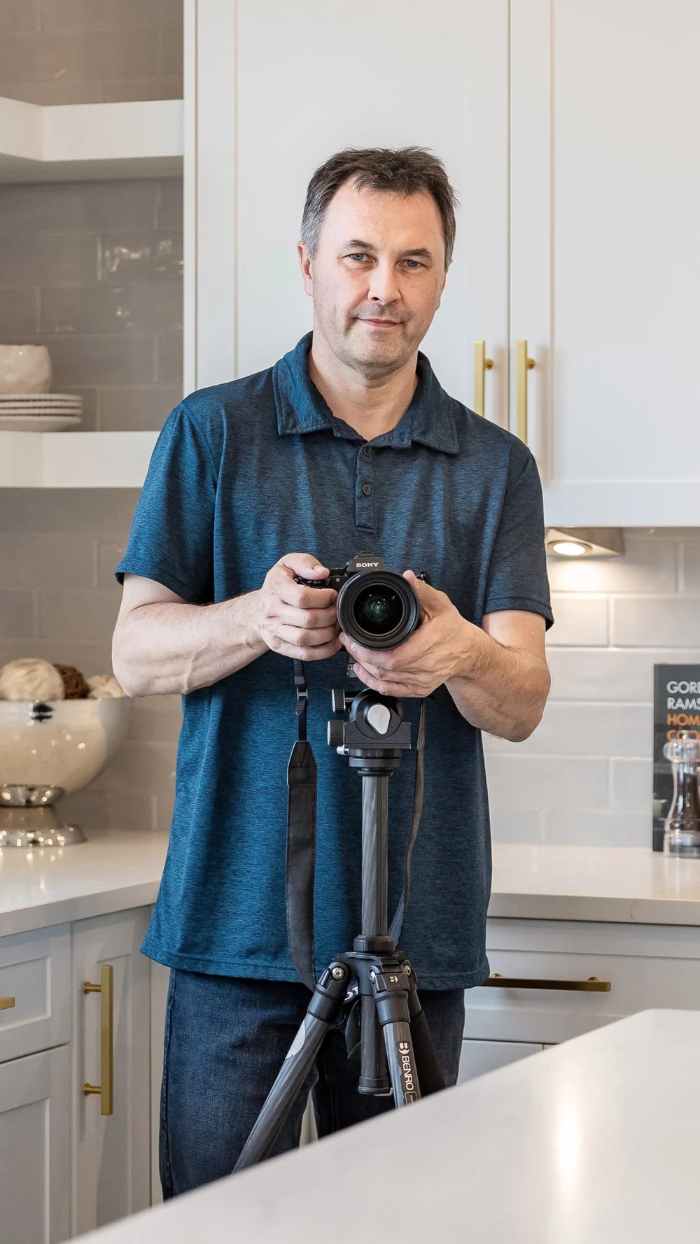 Scott Prokop photographing a Saskatoon home