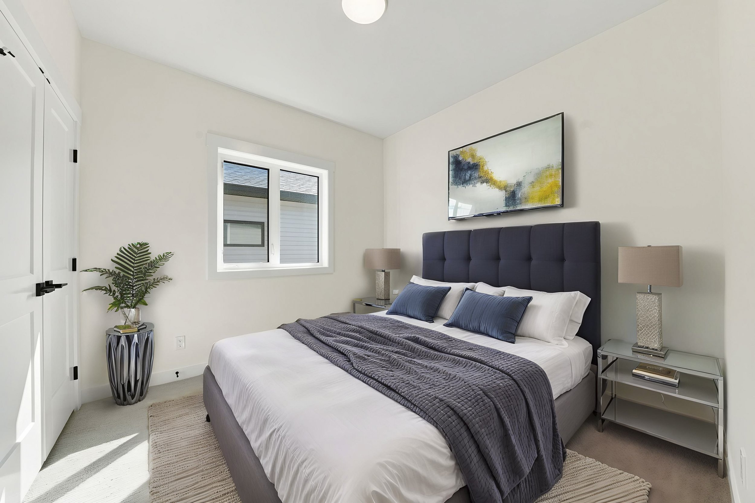 Virtual staging transforms an empty bedroom into a stylish furnished bedroom