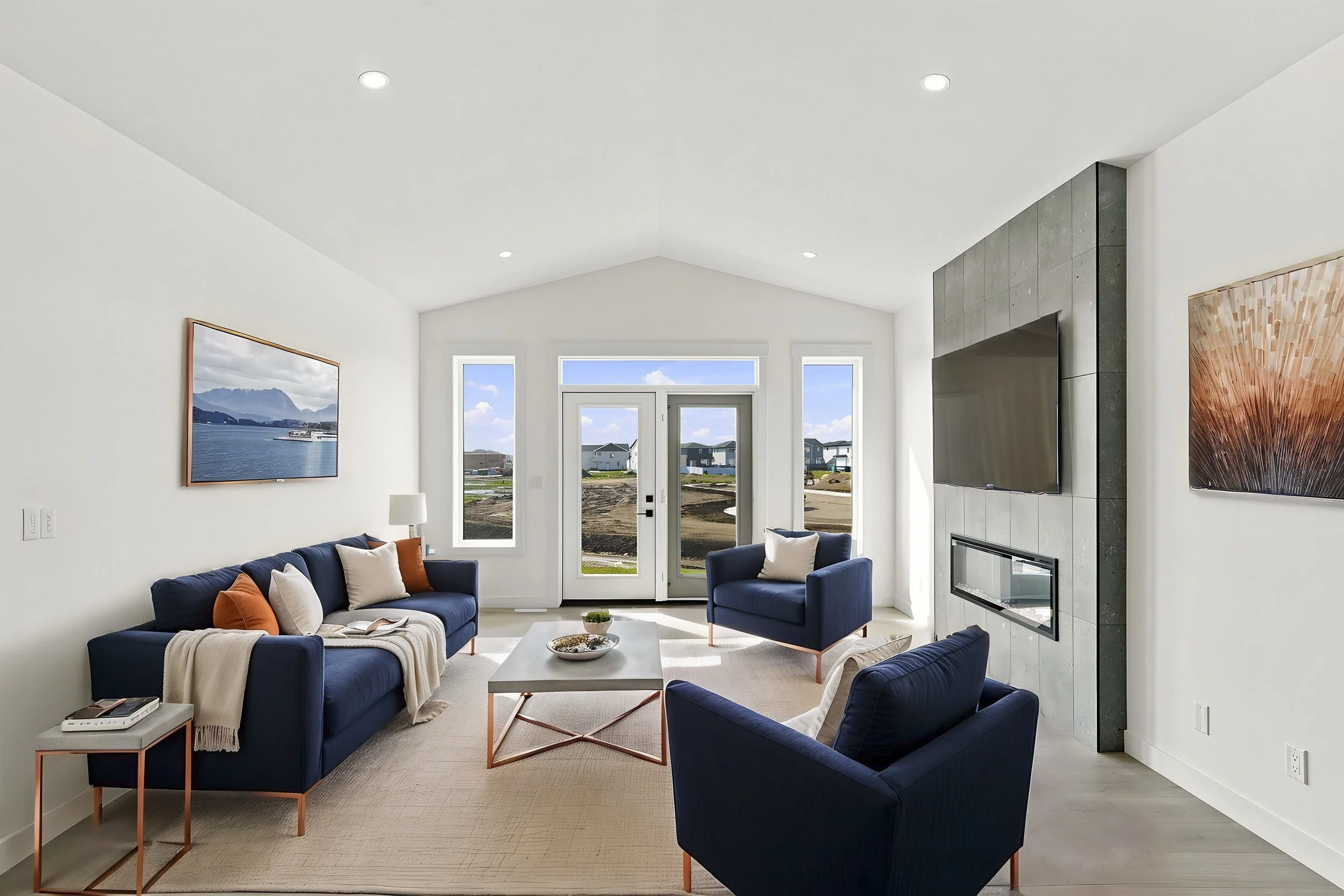 Virtual staging example of a modern living room with blue accent furniture