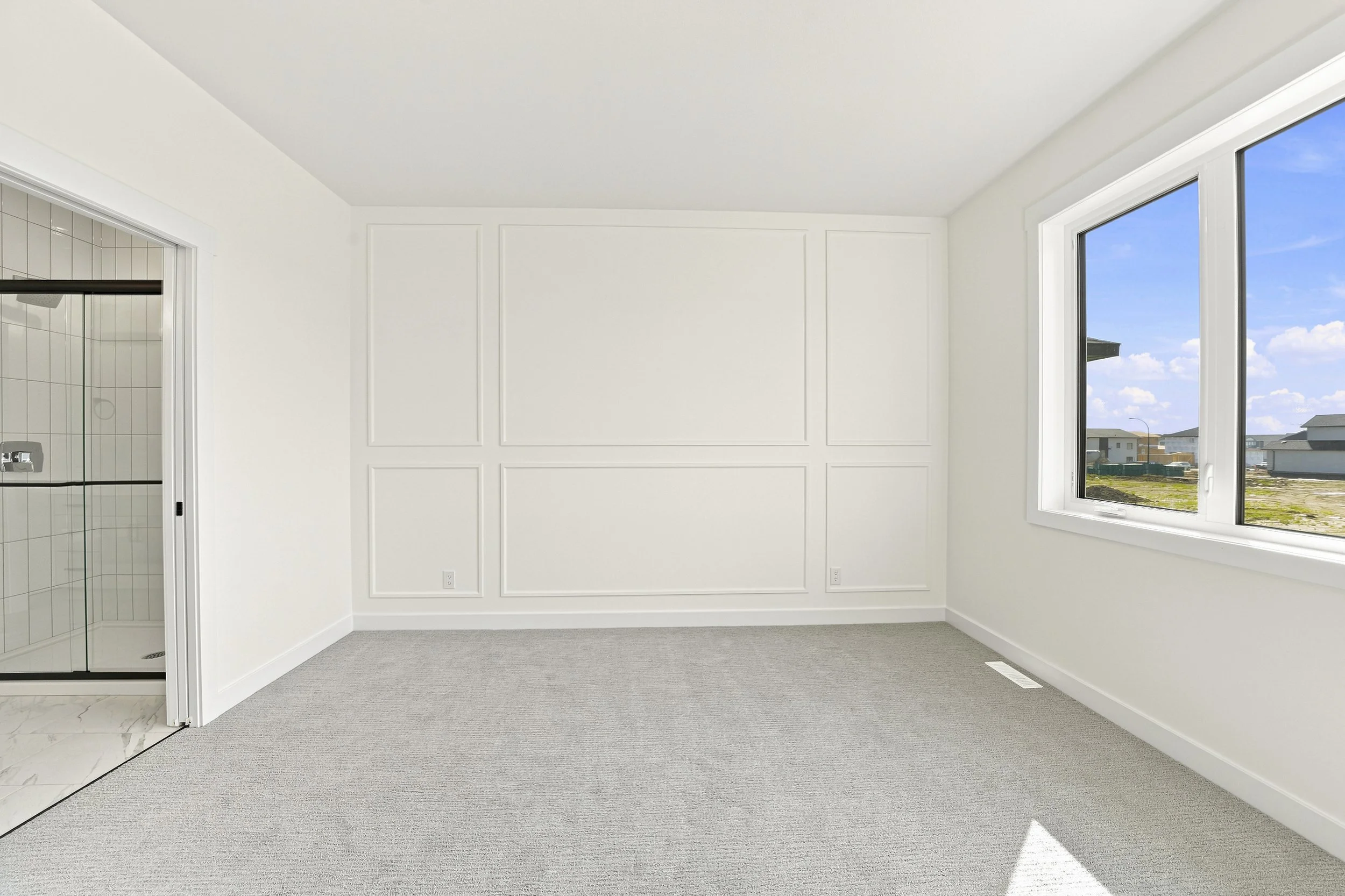 Empty primary bedroom before virtual staging for a real estate listing