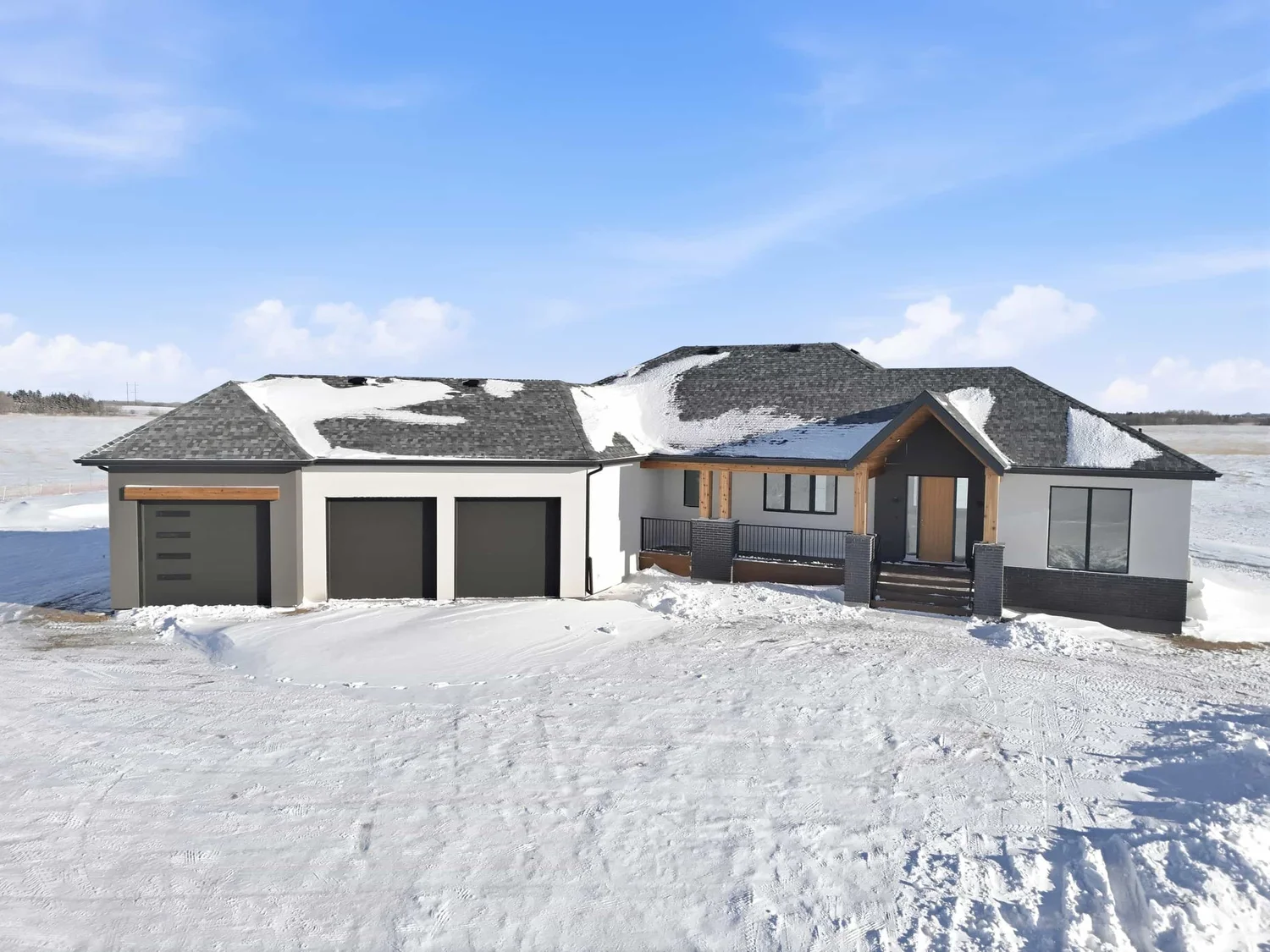 Daytime photograph of a modern Saskatoon home before virtual twilight
