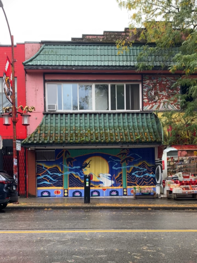 Arty Guava Chinatown mural inspired by the Mid-Autumn Festival, featuring vibrant colours, flowing figures, and symbolic elements celebrating reunion, moonlight, and cultural heritage.