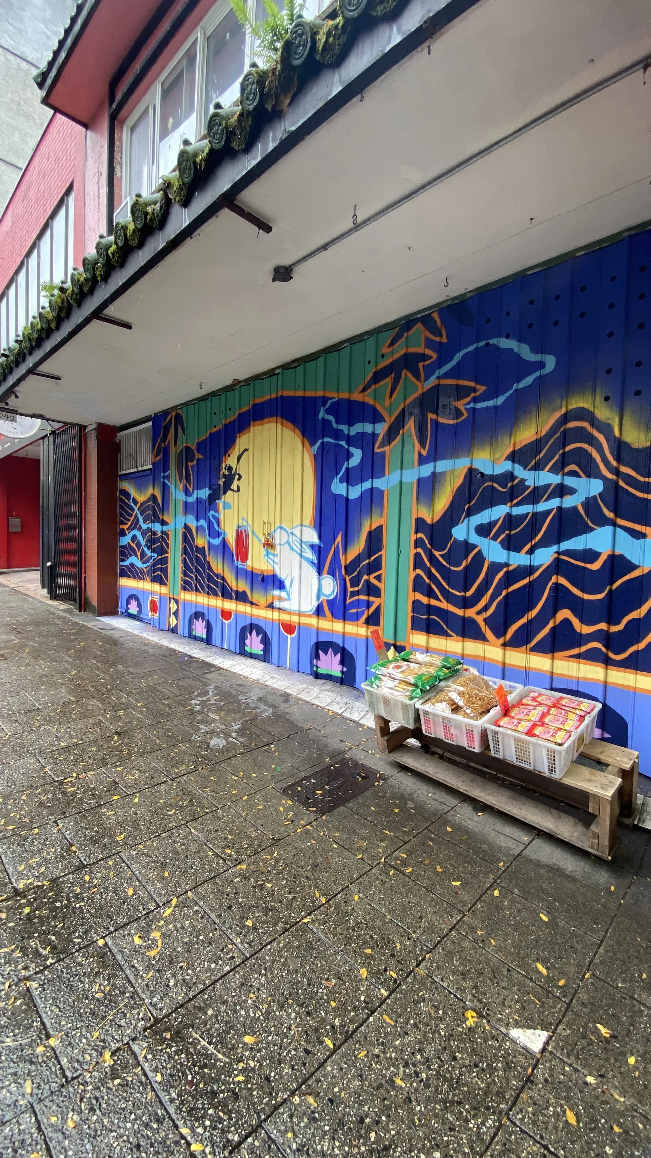Arty Guava Chinatown mural inspired by the Mid-Autumn Festival, featuring vibrant colours, flowing figures, and symbolic elements celebrating reunion, moonlight, and cultural heritage.